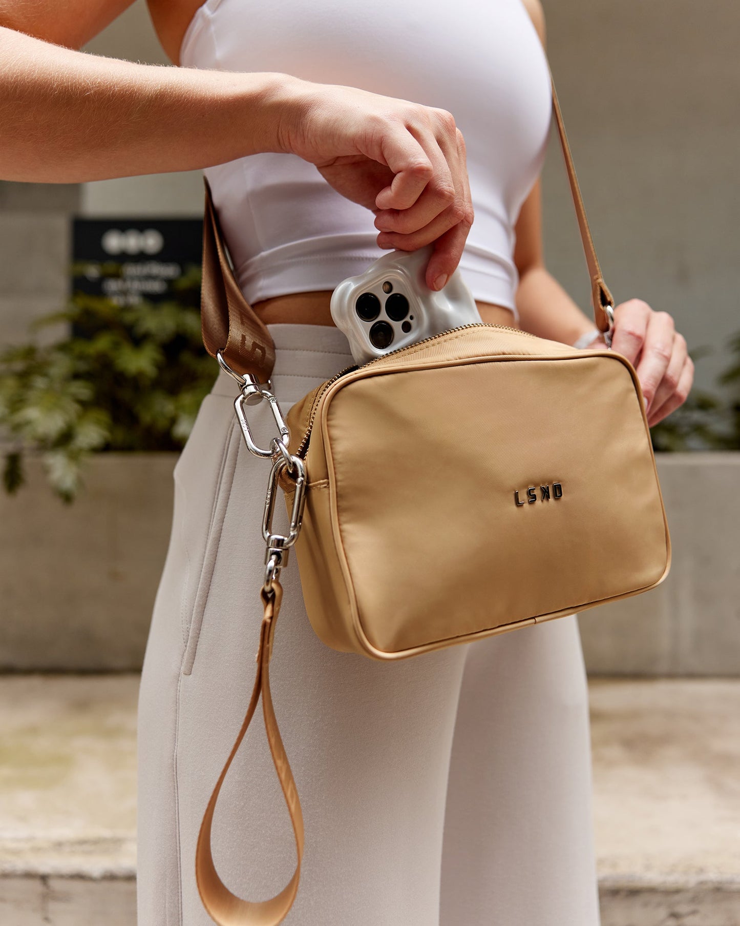 Woman wearing Go-To Shoulder Bag - Oat Milk