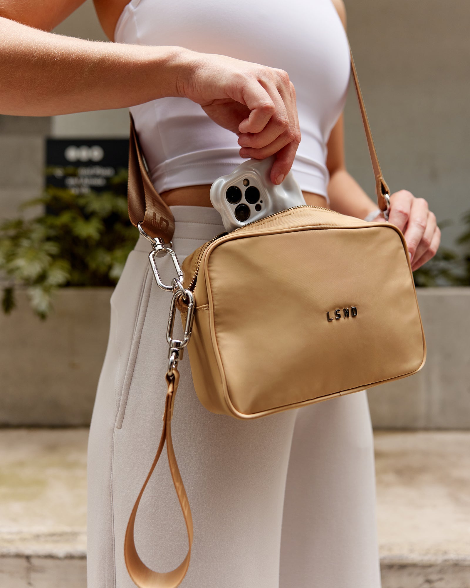 Woman wearing Go-To Shoulder Bag - Oat Milk