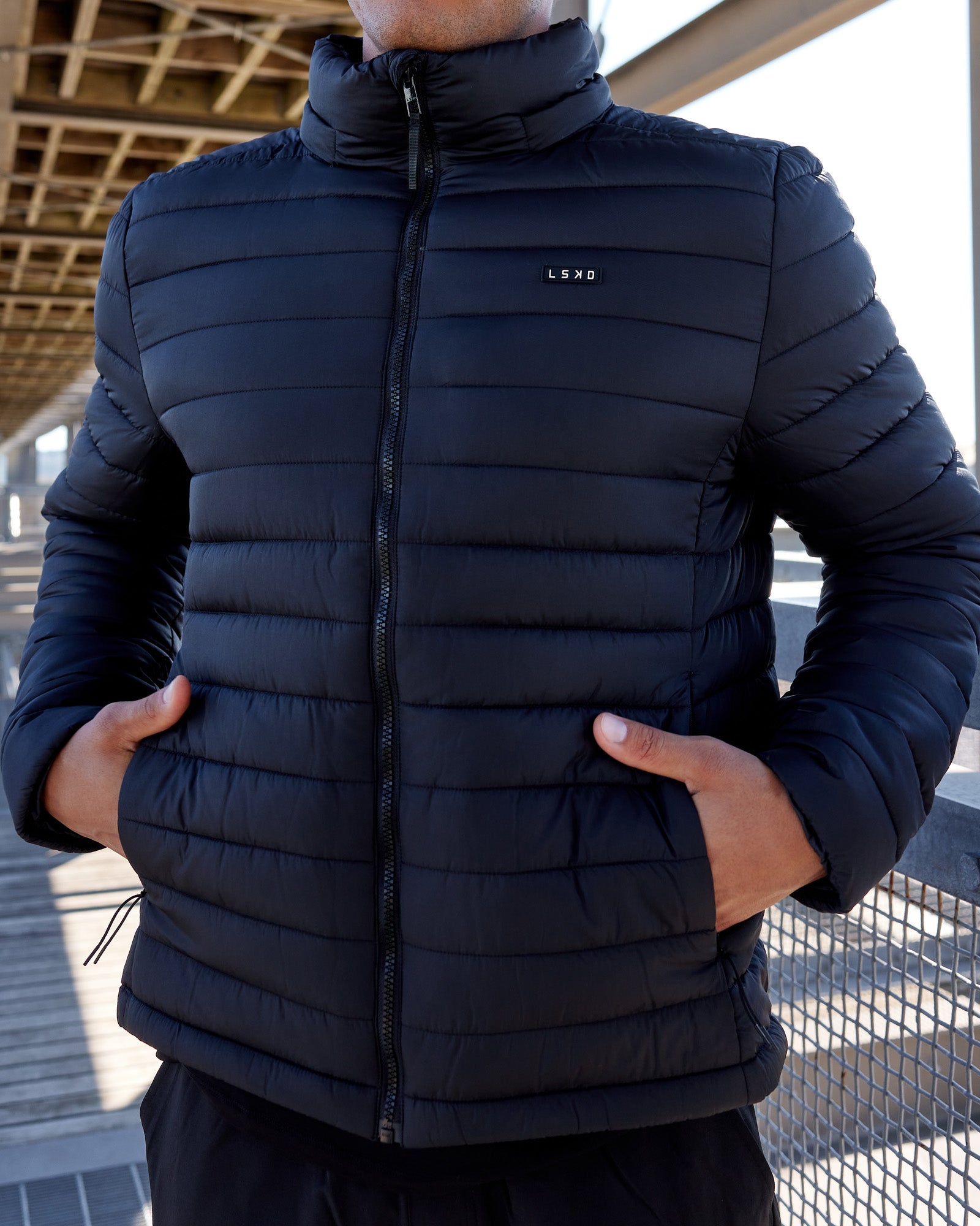 Man wearing All-day Puffer Jacket - Black