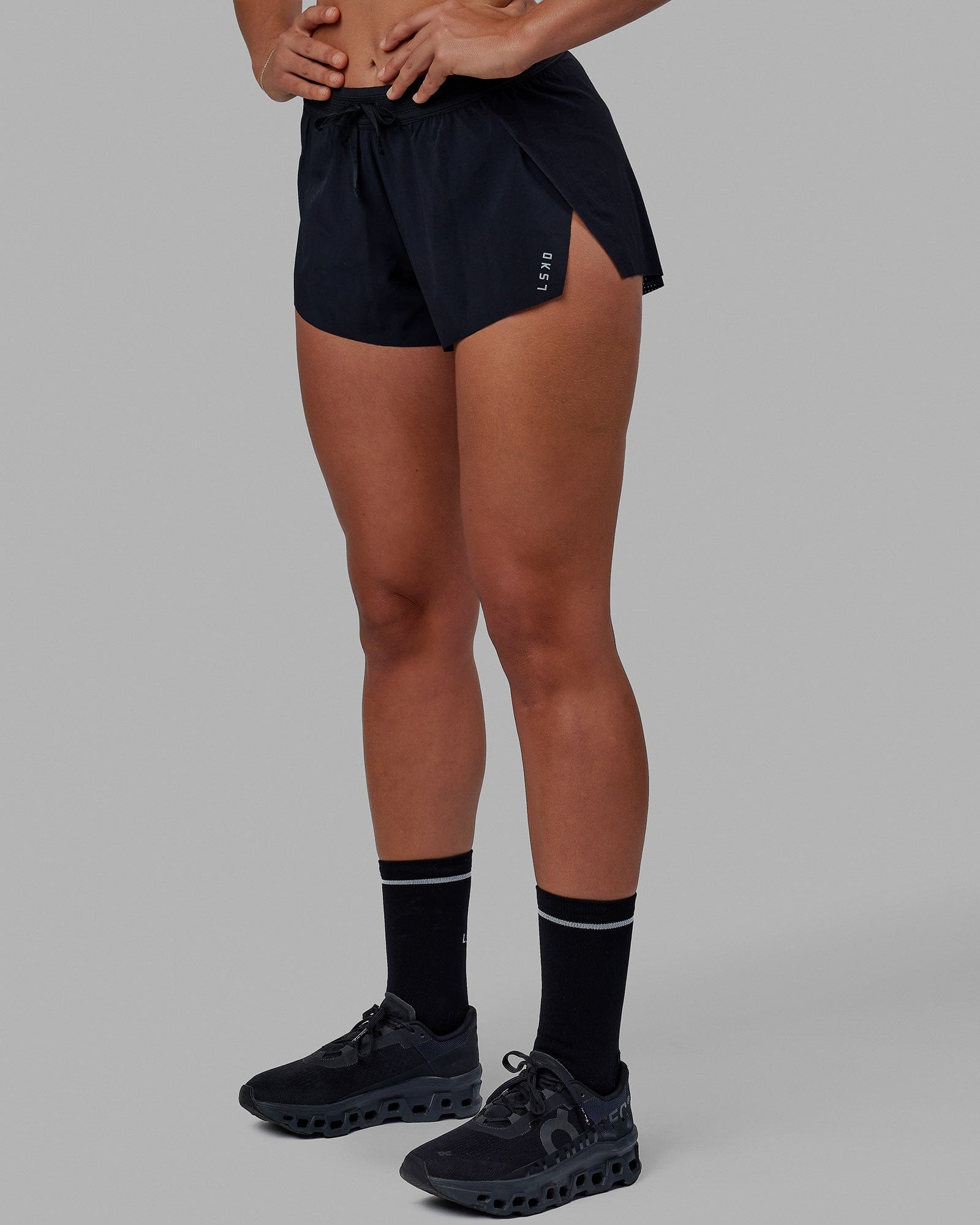 Woman wearing Accelerate Run Shorts - Black