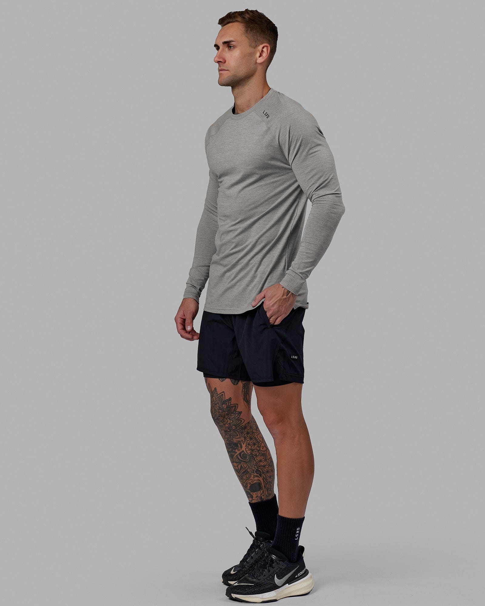 Man wearing Challenger 6" Lined Performance Short - Black