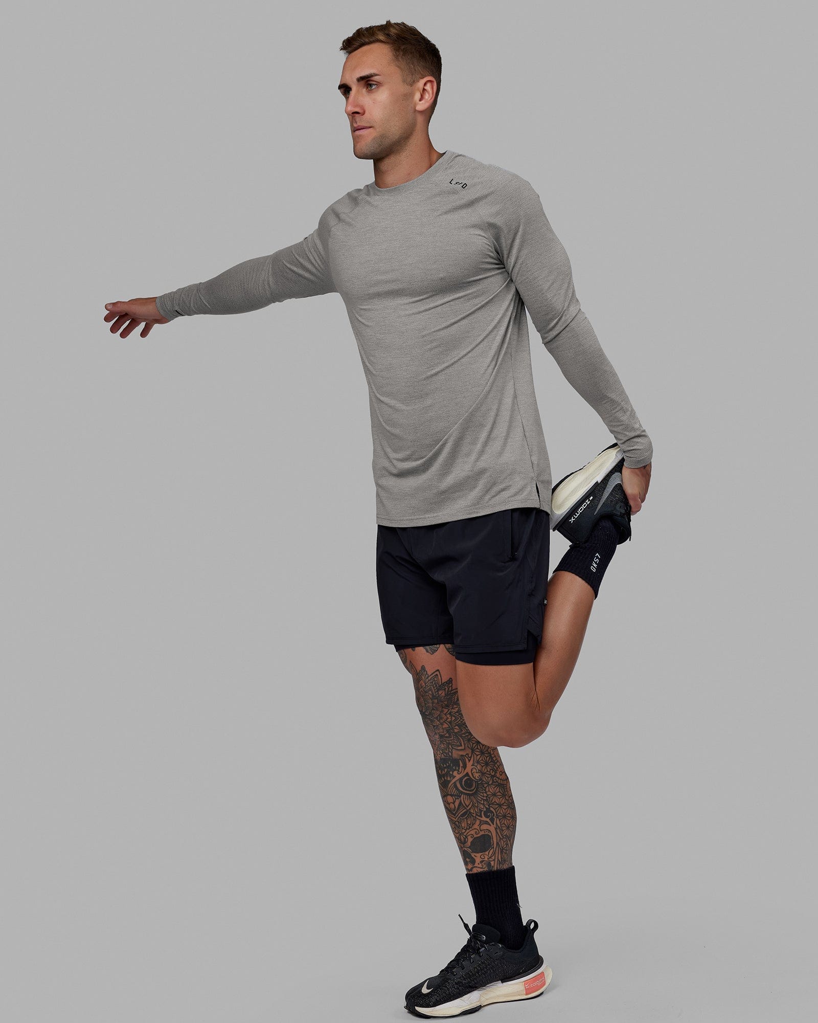 Man wearing Challenger 6" Lined Performance Short - Black