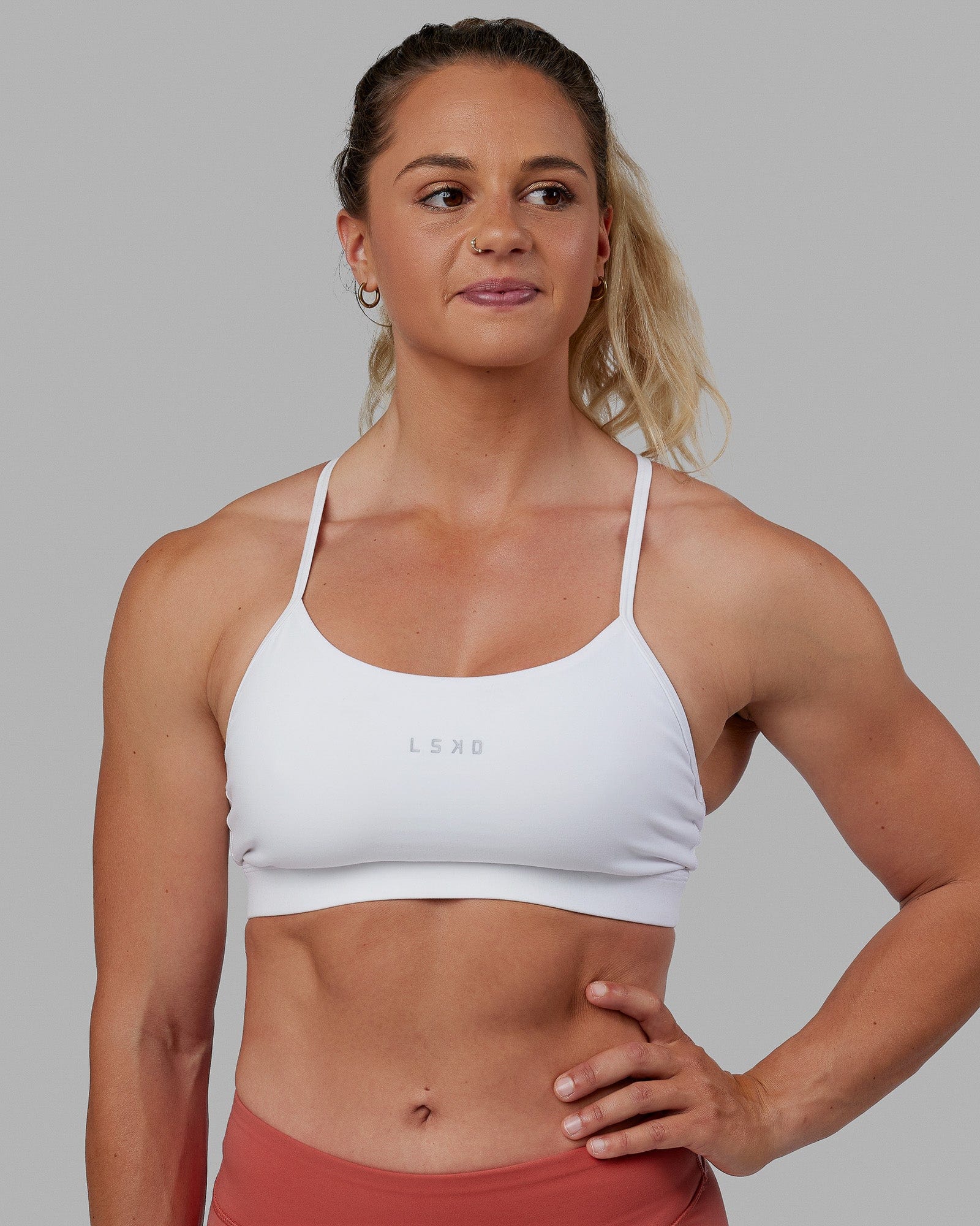 Woman wearing Lift Sports Bra - White