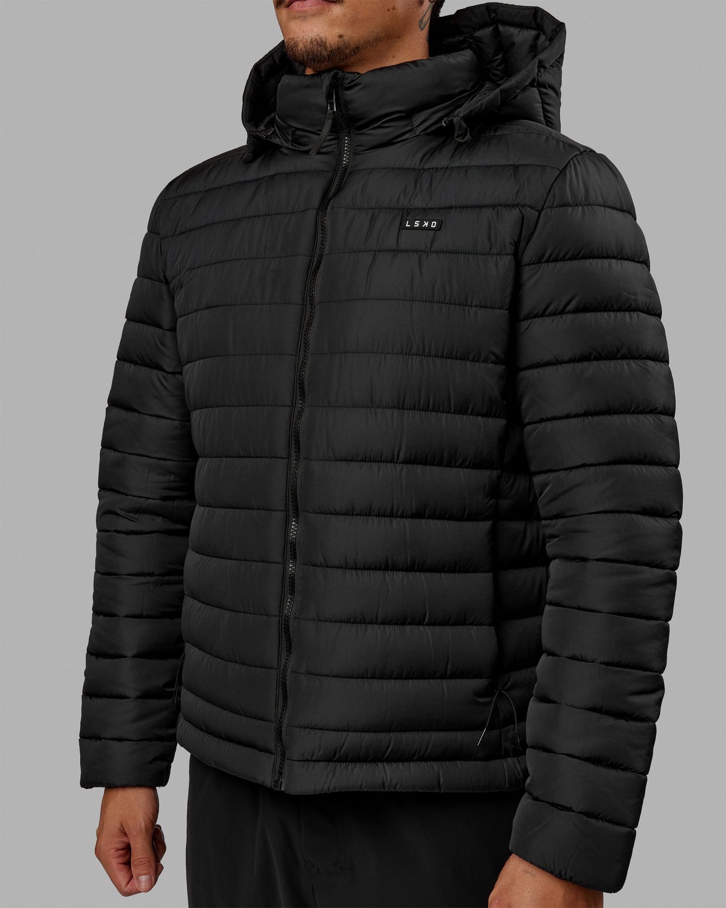 Man wearing All-day Puffer Jacket - Black