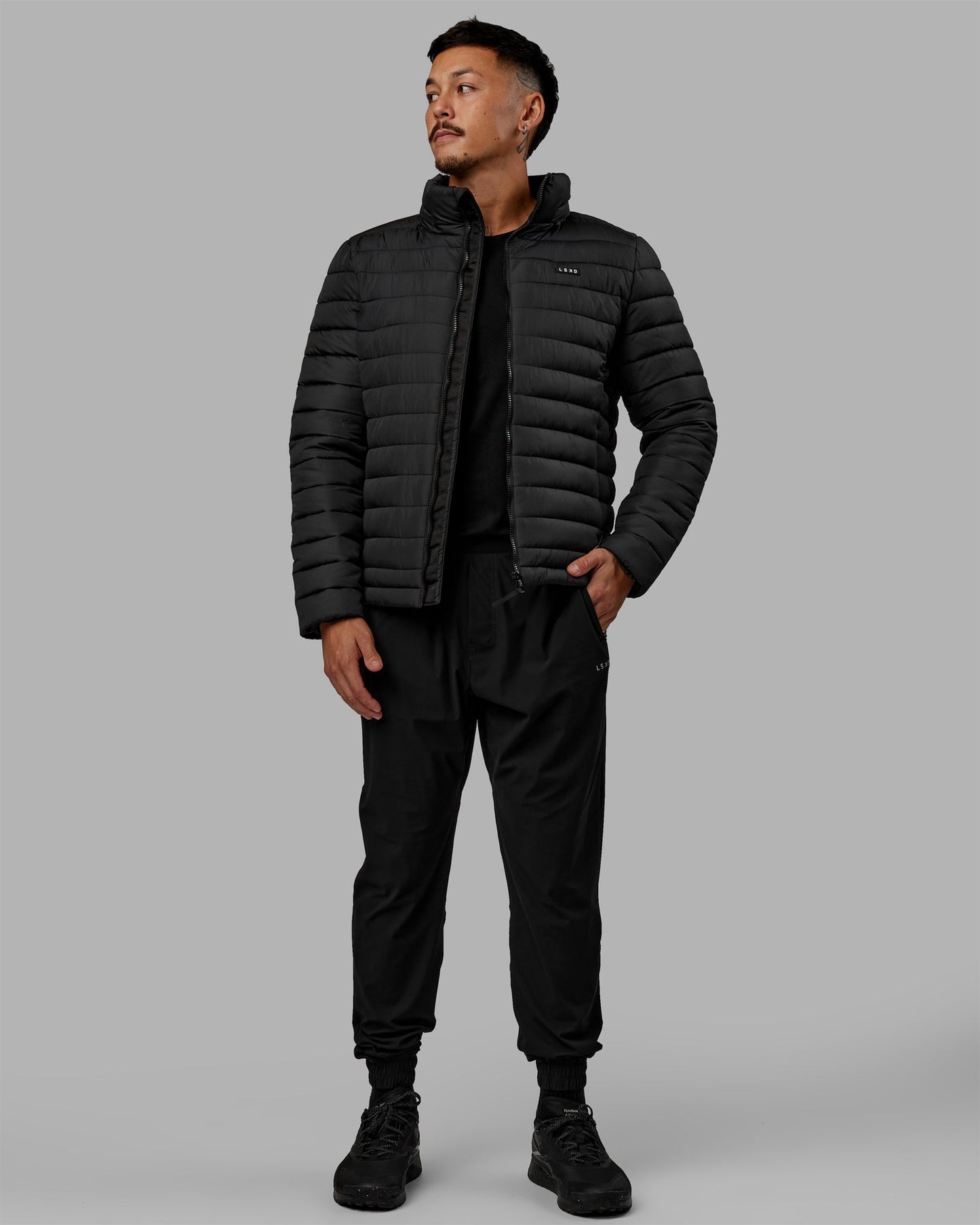 Man wearing All-day Puffer Jacket - Black