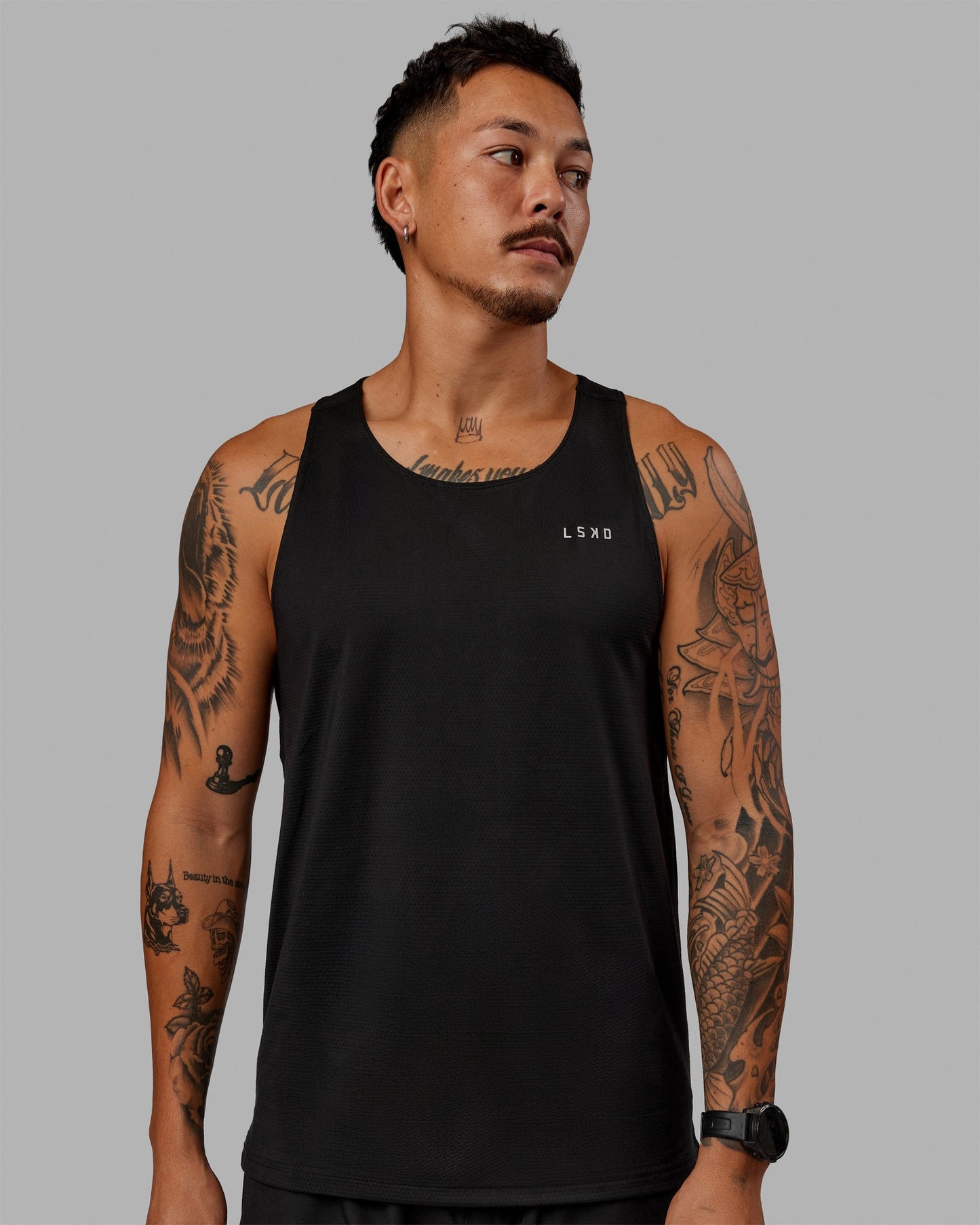 Man wearing Perform VapourFLX Tank - Black-Reflective