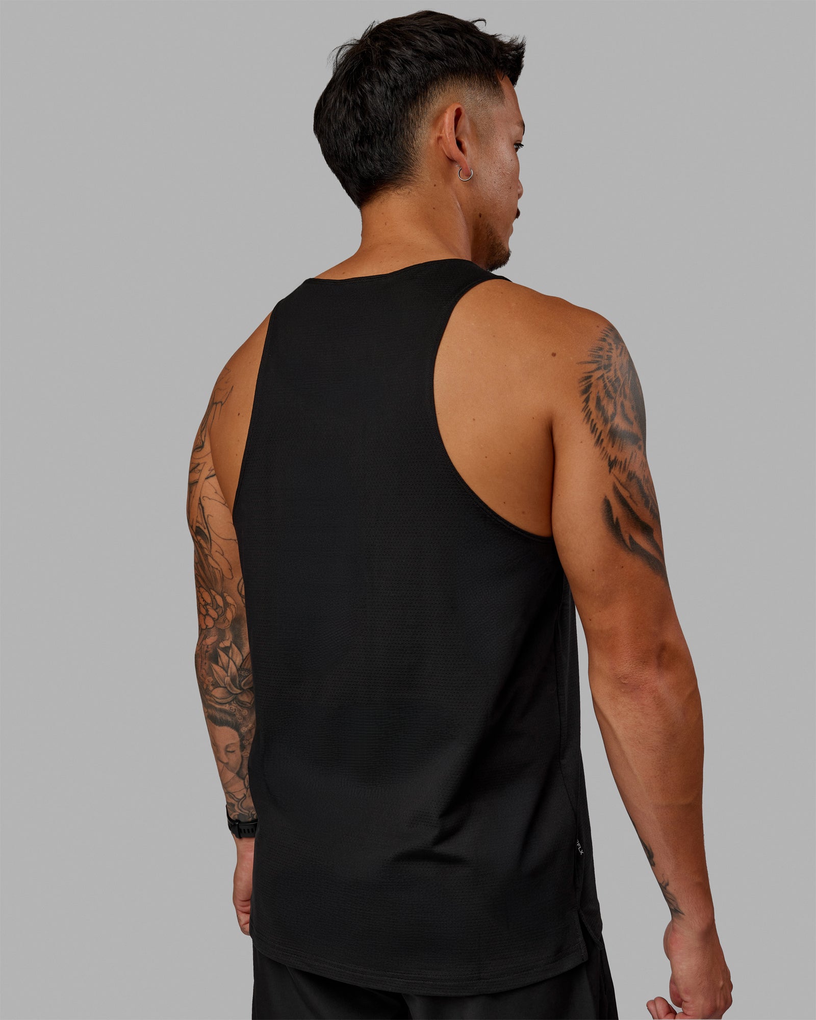 Man wearing Perform VapourFLX Tank - Black-Reflective