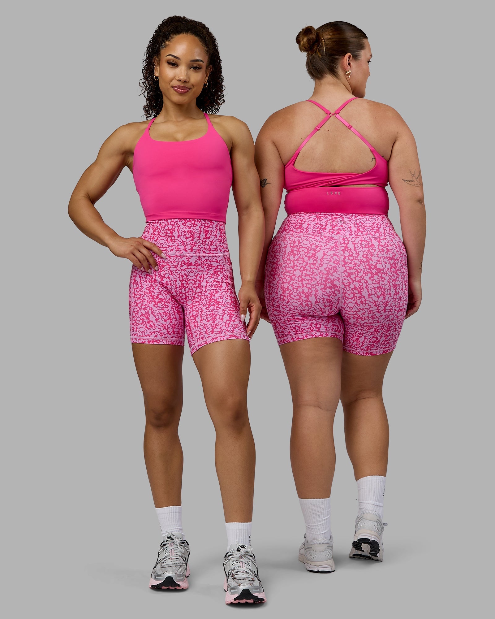 Woman wearing Twist Shelf Bra Tank - Ultra Pink