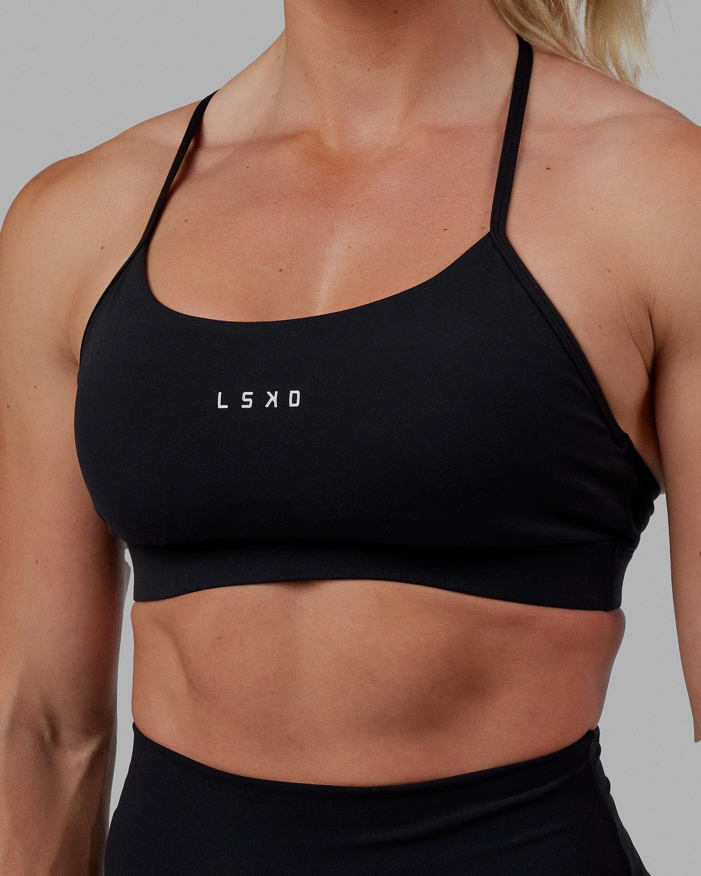 Woman wearing Lift Sports Bra - Black