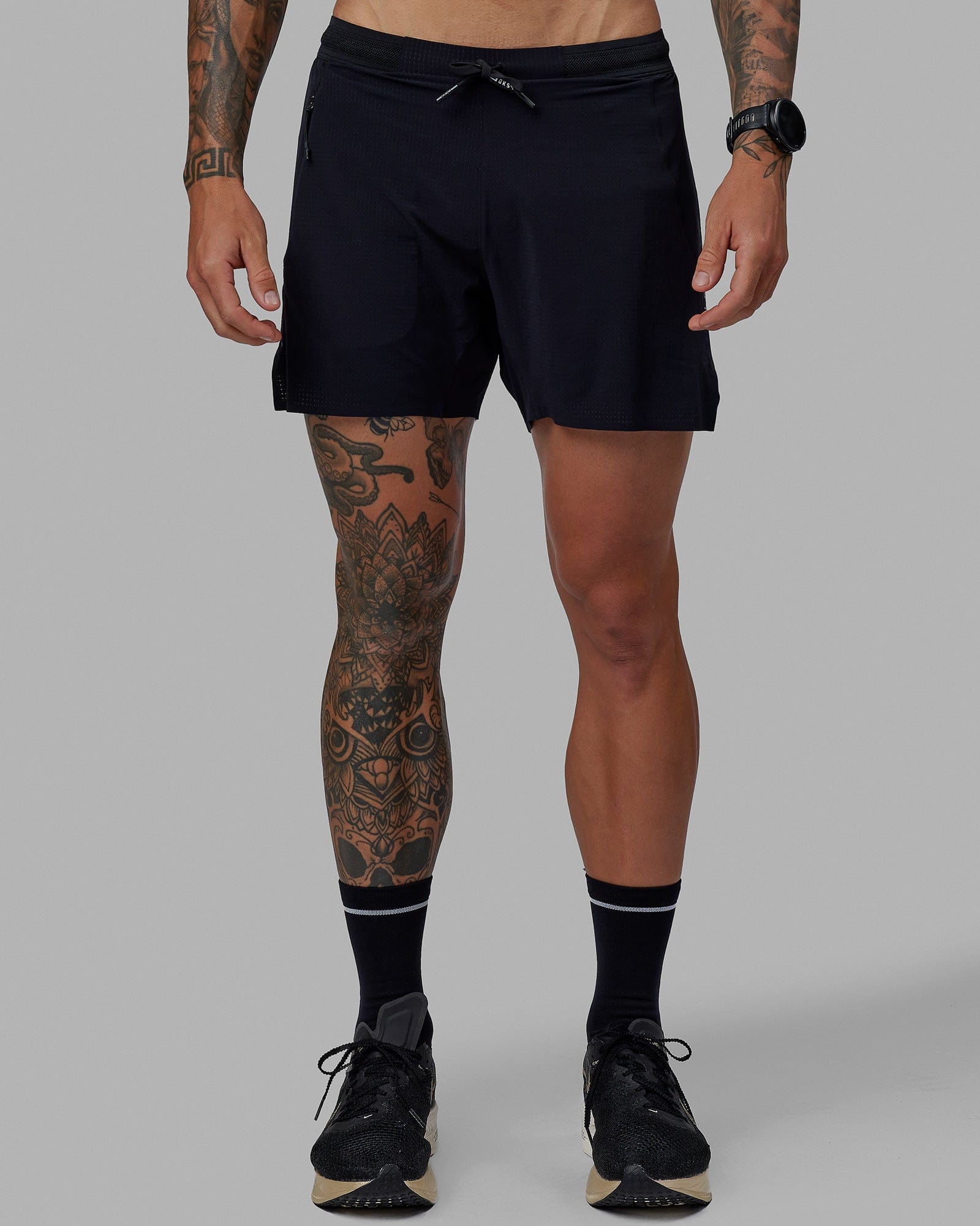 Man wearing UltraAir 5" Lined Performance Short - Black-Reflective