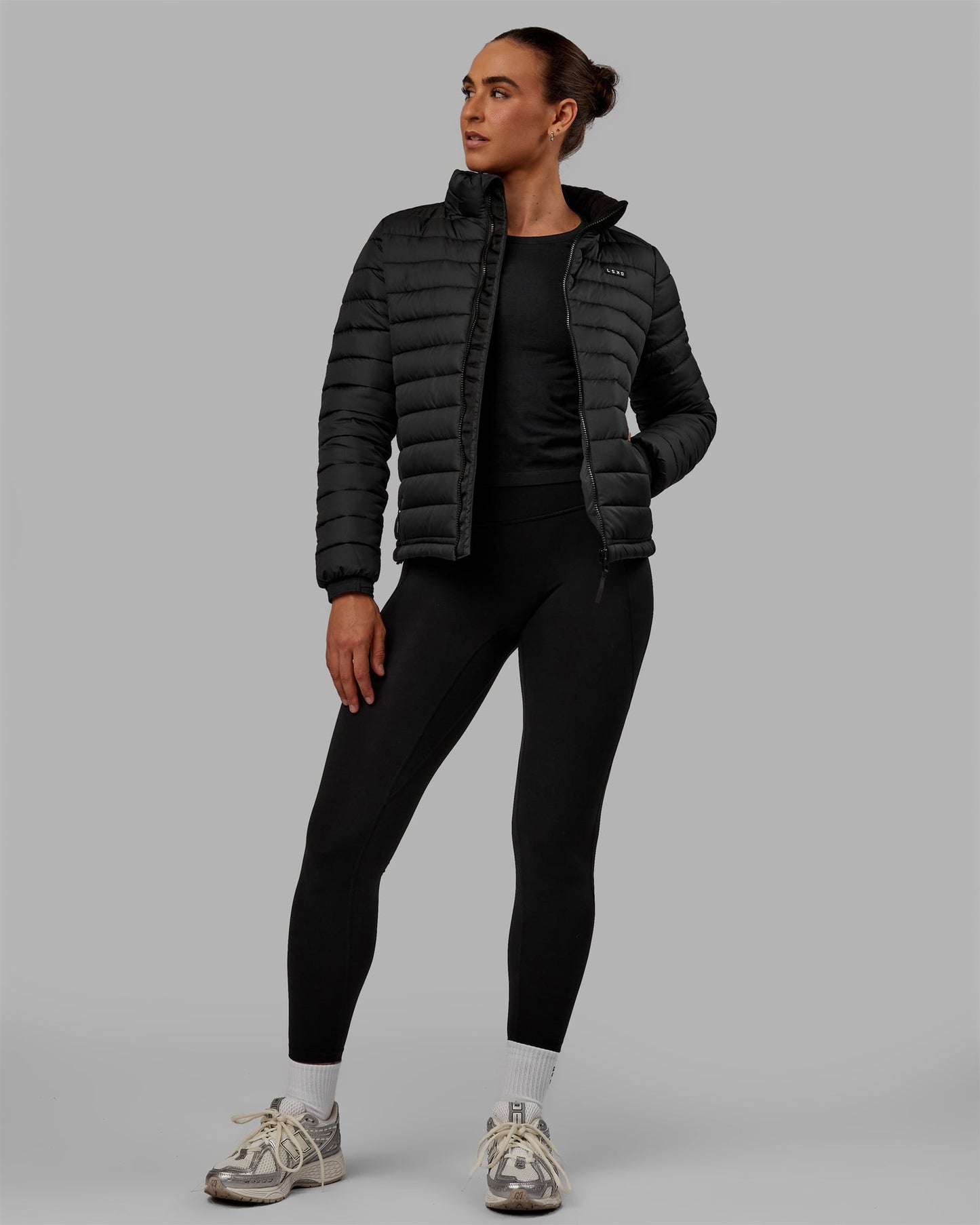 Woman wearing All-day Puffer Jacket - Black