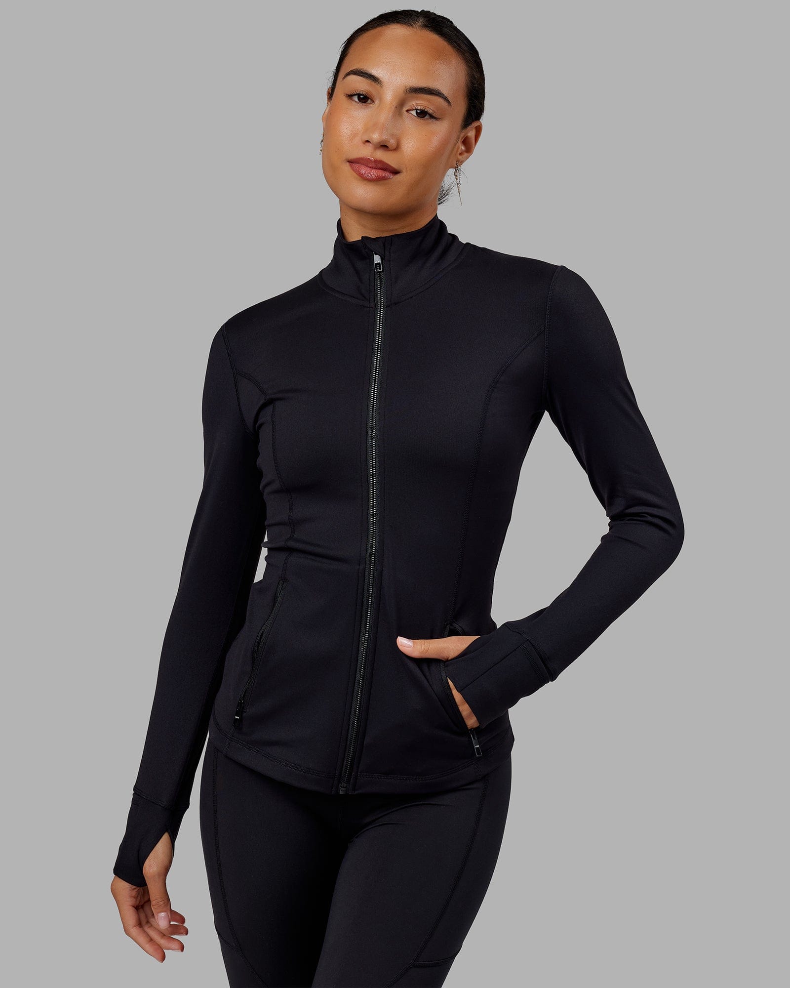 Woman wearing Stride Zip Through Jacket - Black