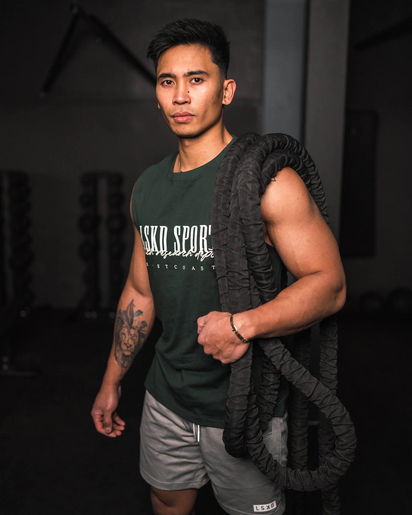 Model wearing Faculty Tank Vintage Fit - Vital Green