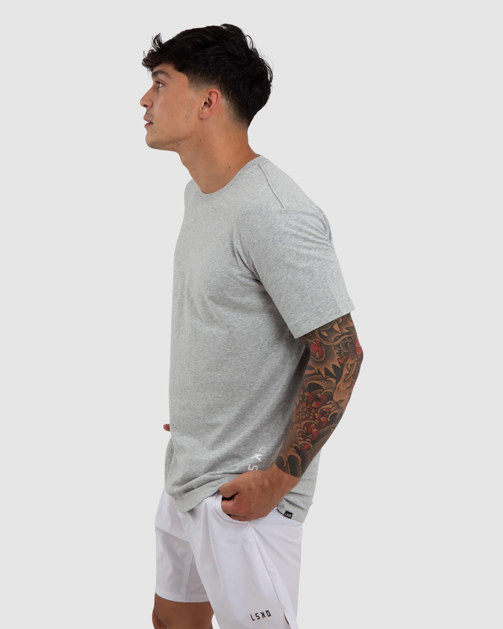 Model wearing Vitality Tee - Lt Grey Marl