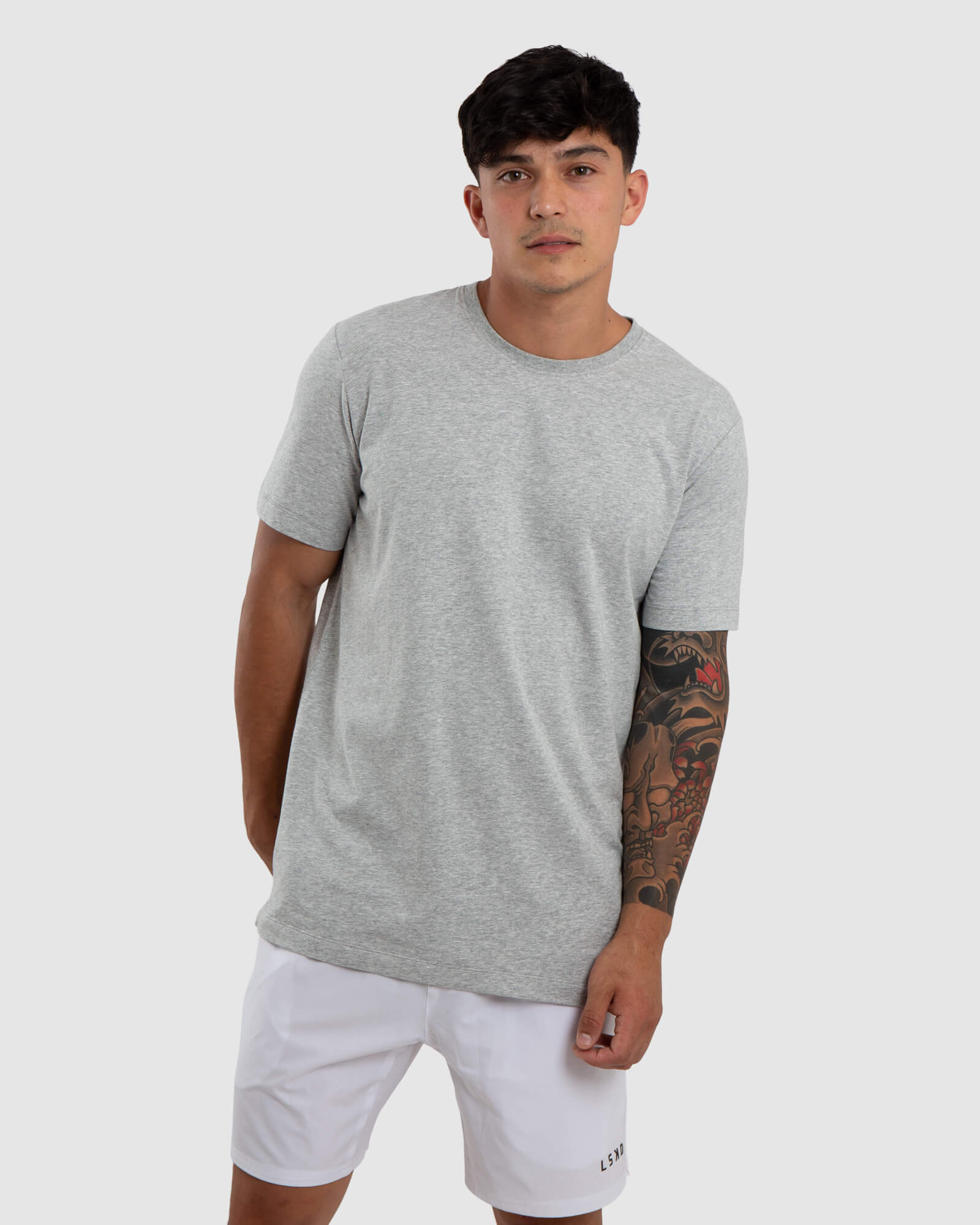 Model wearing Vitality Tee - Lt Grey Marl