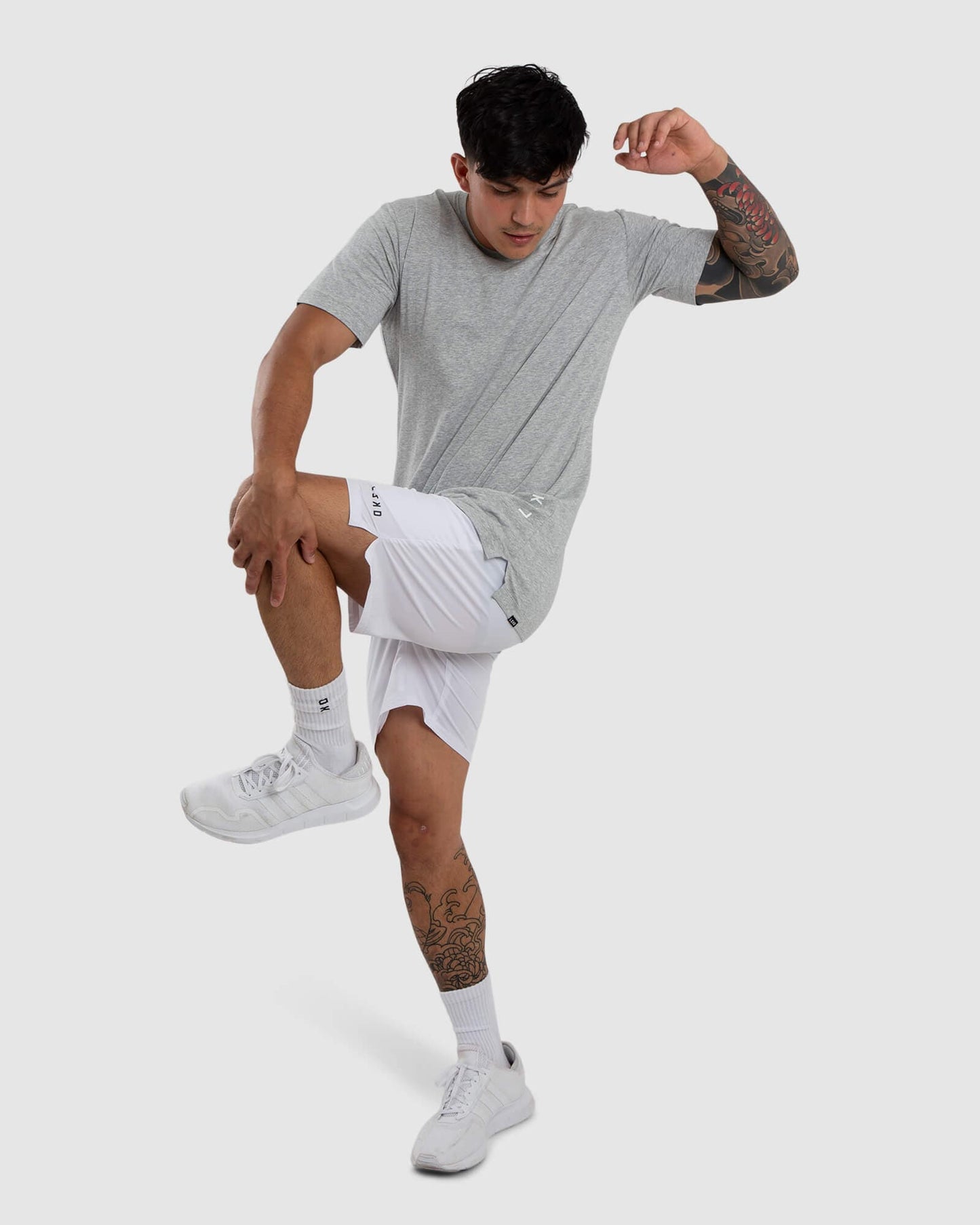 Model wearing Vitality Tee - Lt Grey Marl