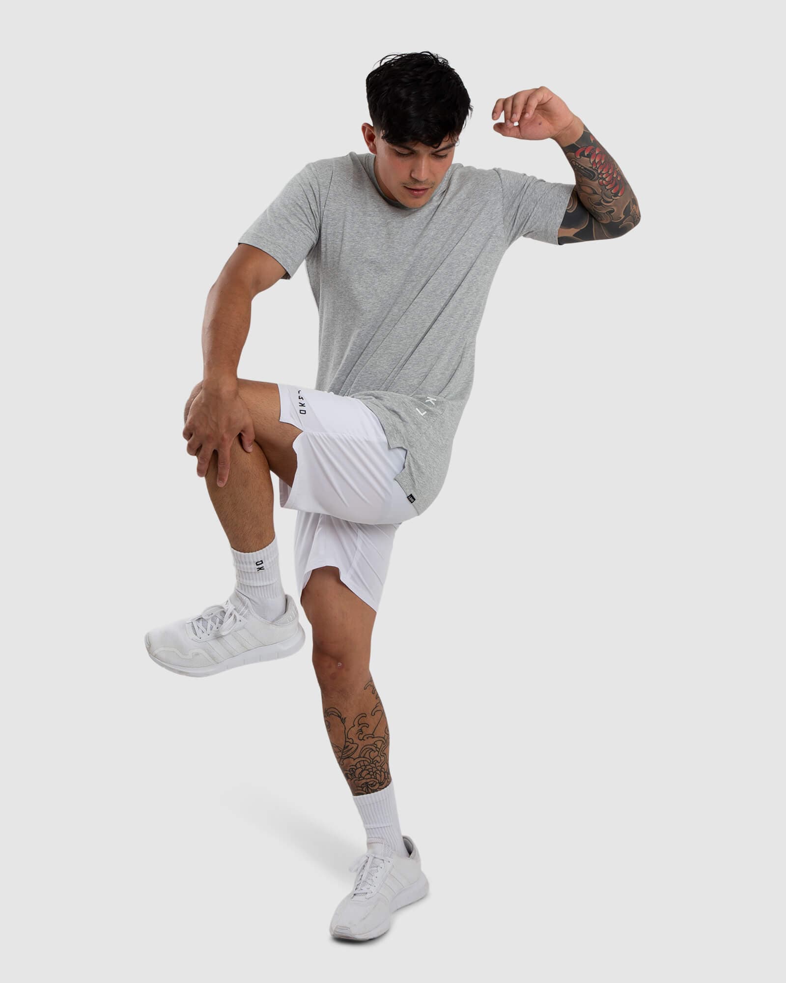 Model wearing Vitality Tee - Lt Grey Marl