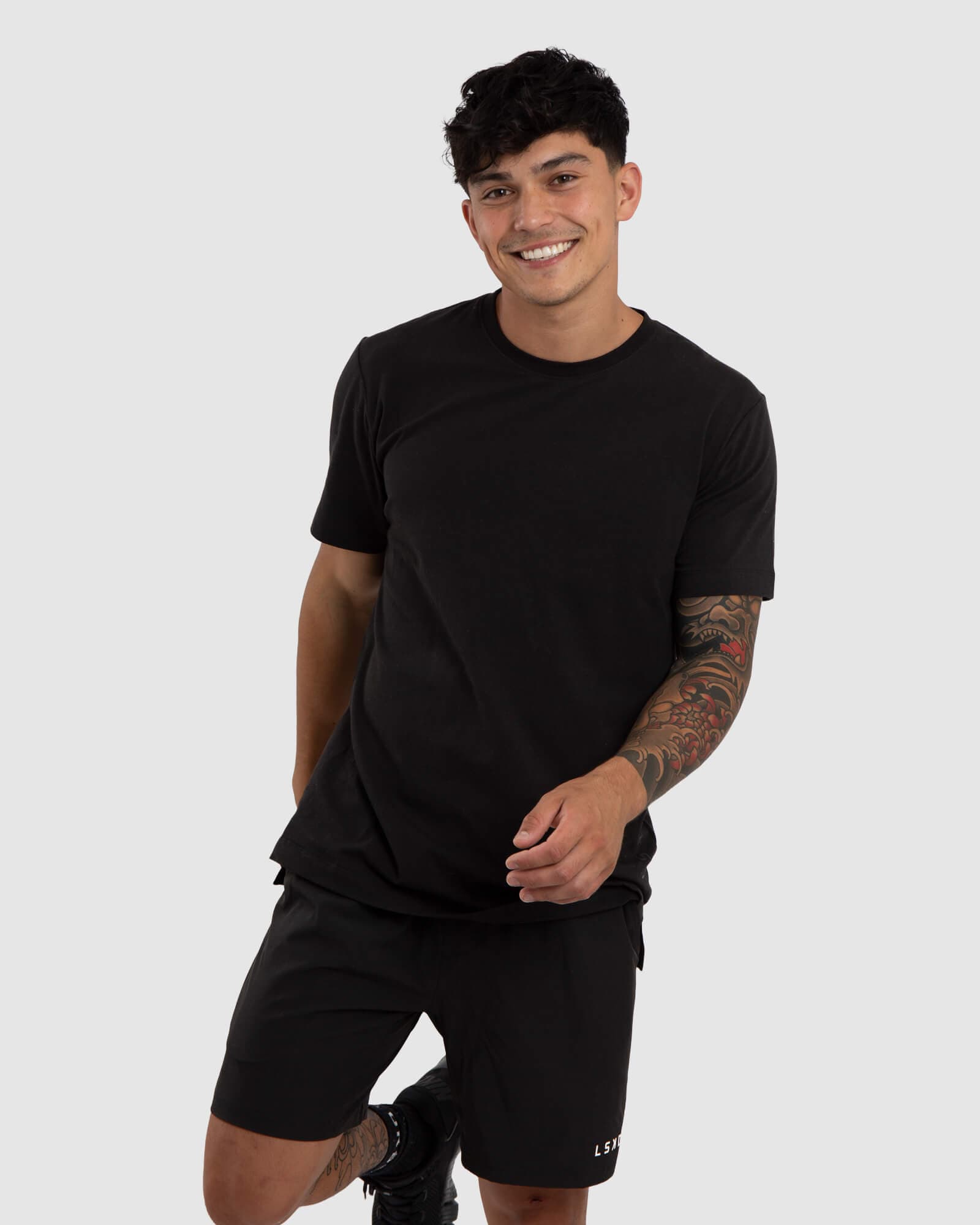 Model wearing Vitality Tee - Black