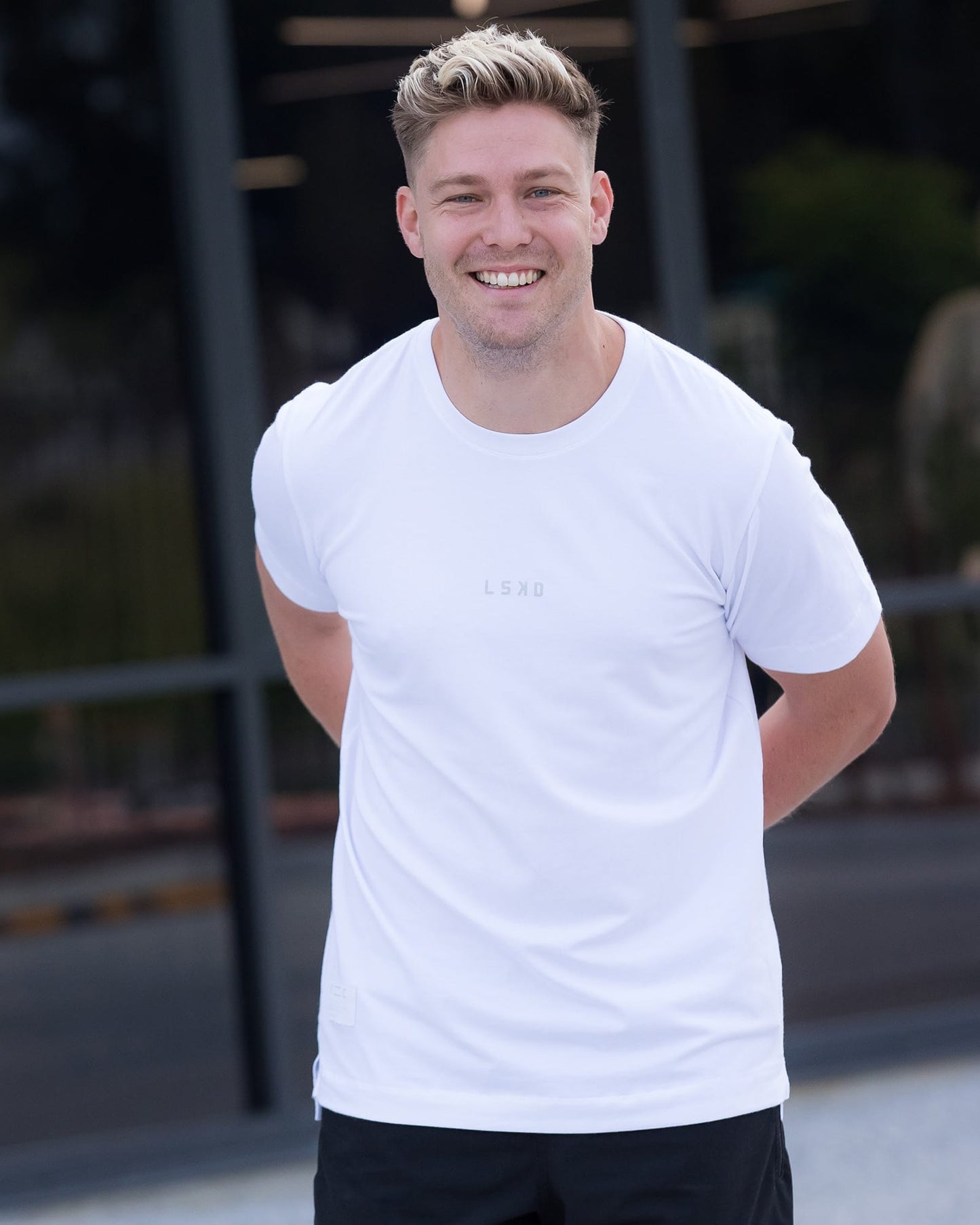 Model wearing Run Club FLXDRY Performance Tee - White-Reflective