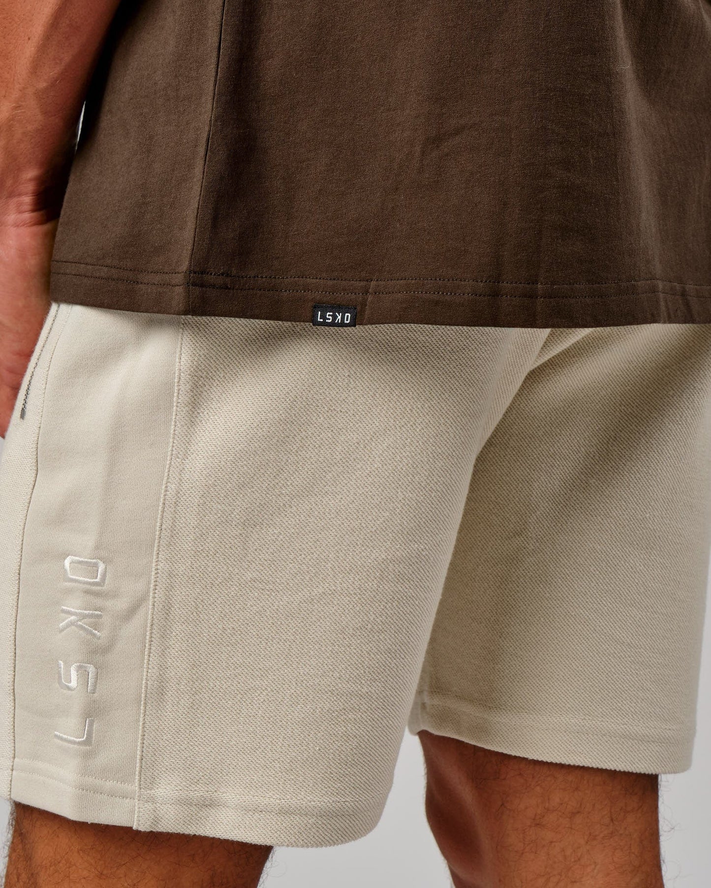 Model wearing Ascent Tee Oversize - Walnut