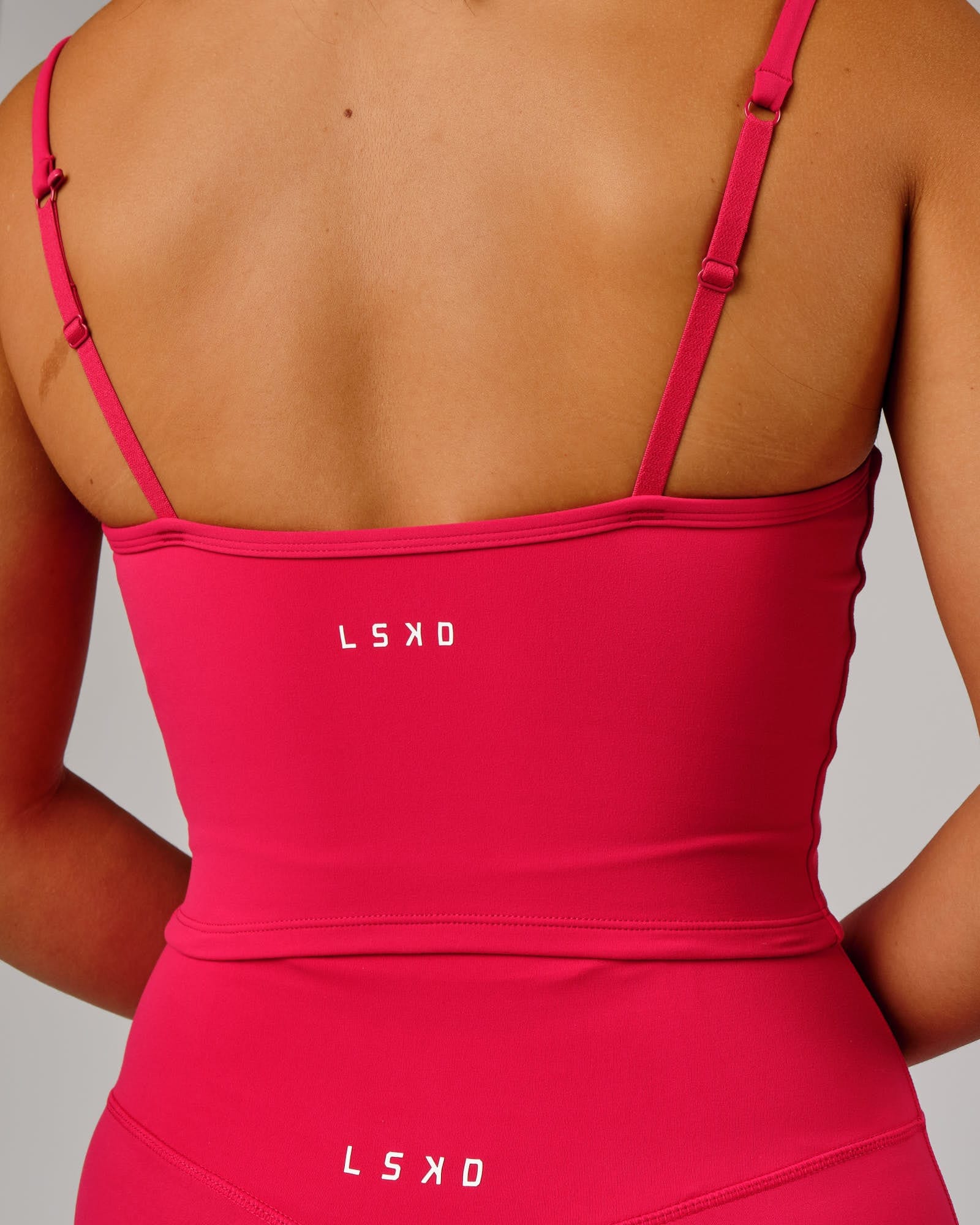 Model wearing Elixir Active Tank - Boysenberry