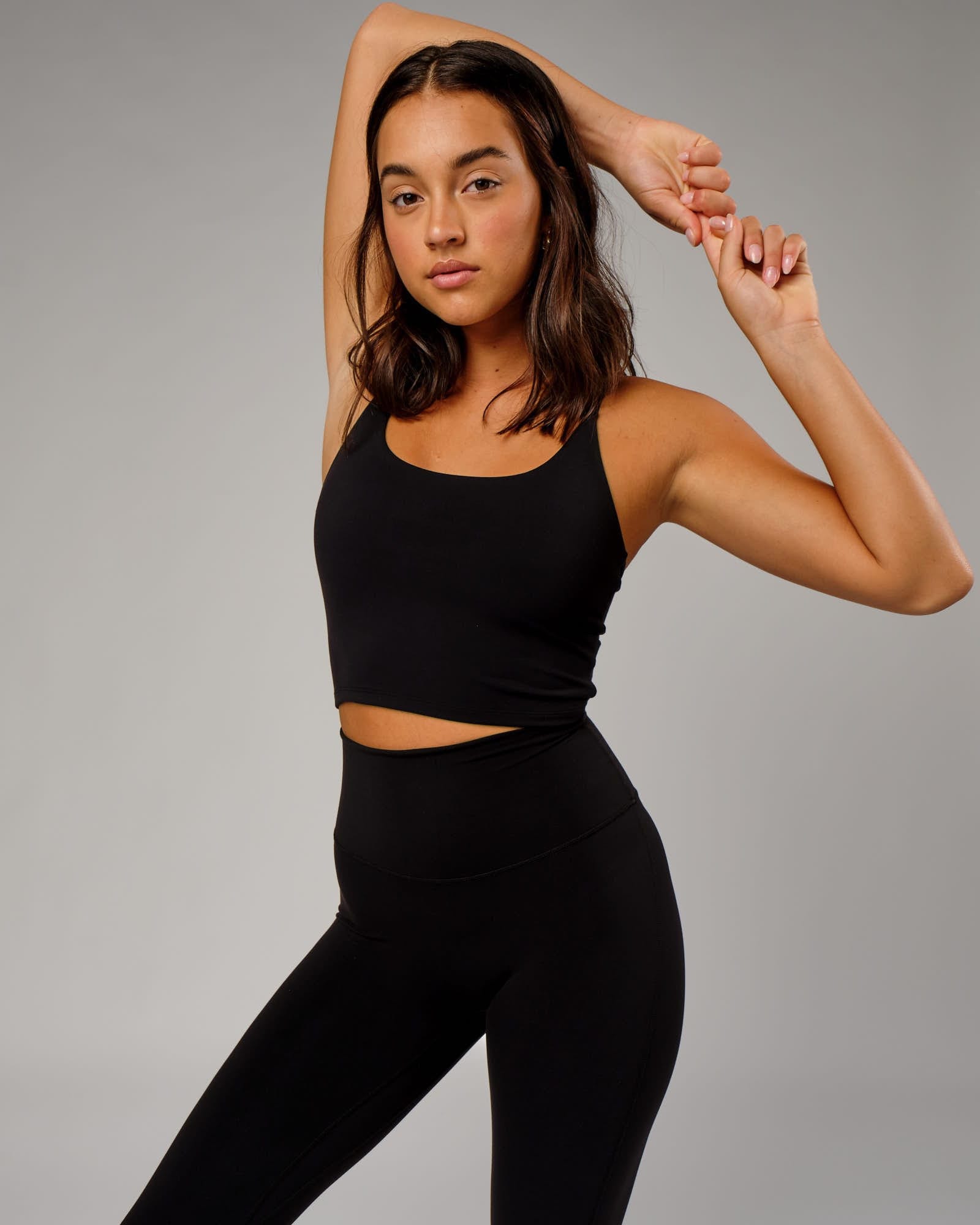 Model wearing Elixir Active Tank - Black