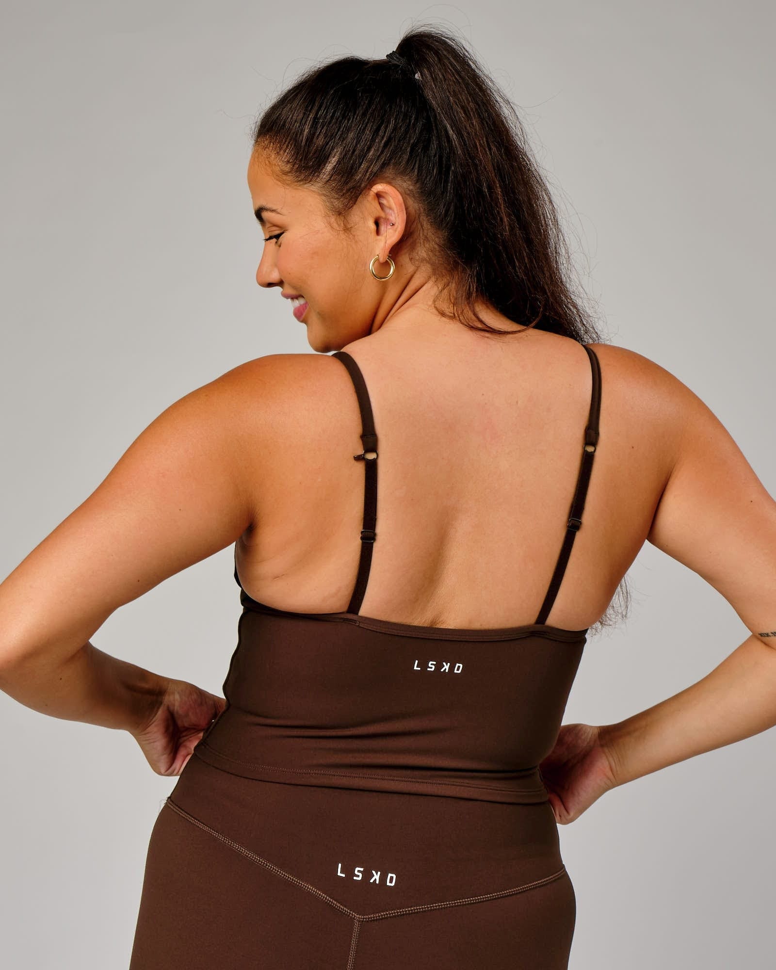 Model wearing Elixir Active Tank - Chocolate