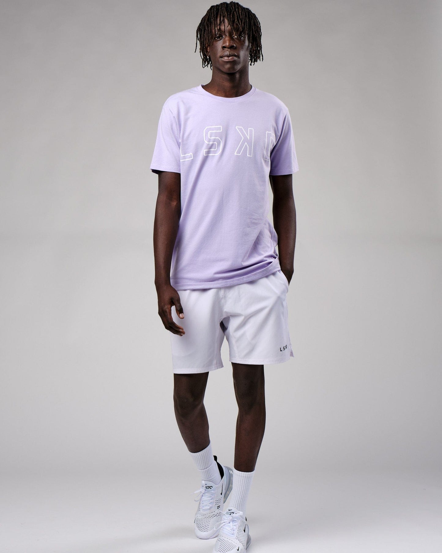 Model wearing Expand FLXCotton Tee - Cosmic Sky