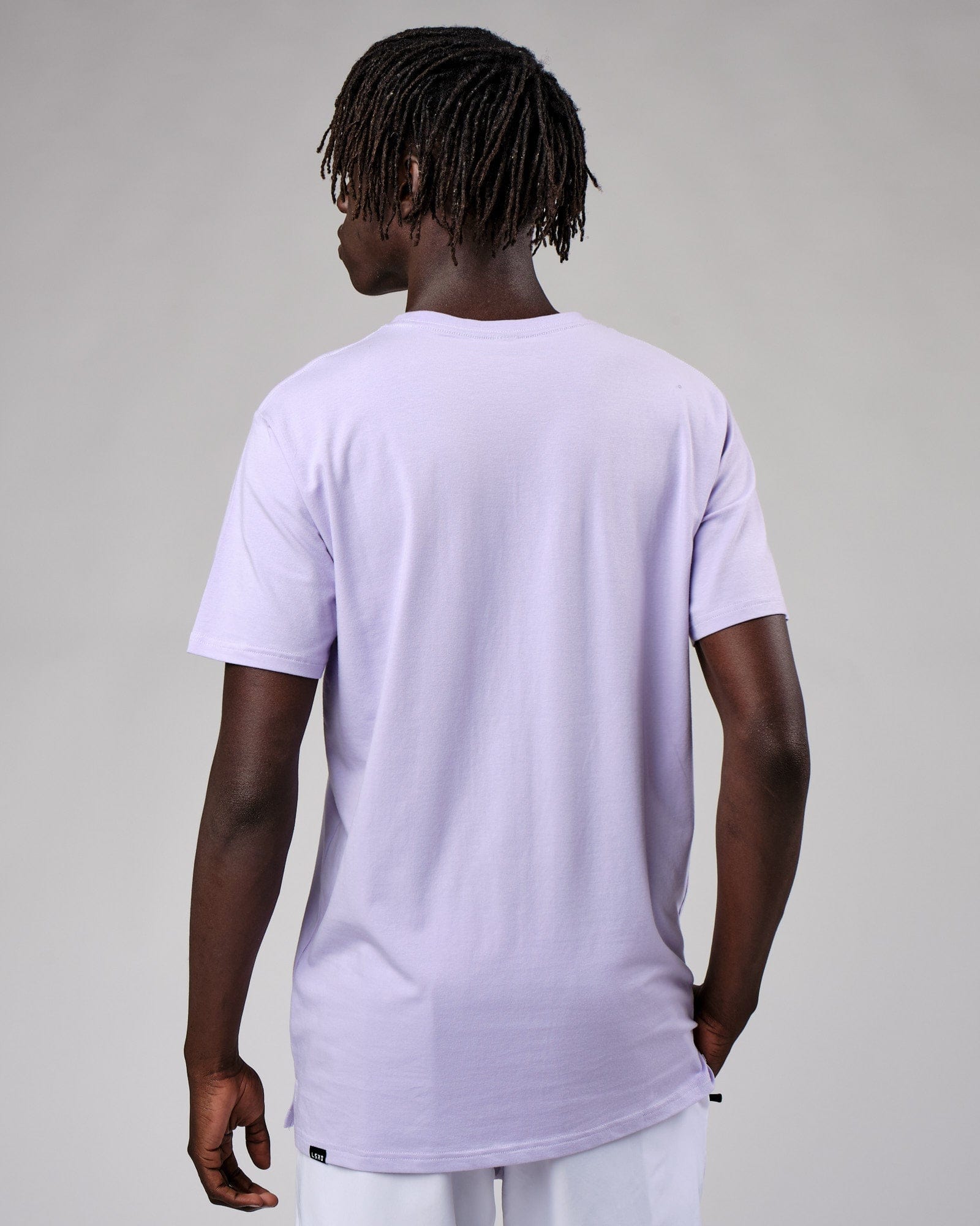 Model wearing Expand FLXCotton Tee - Cosmic Sky