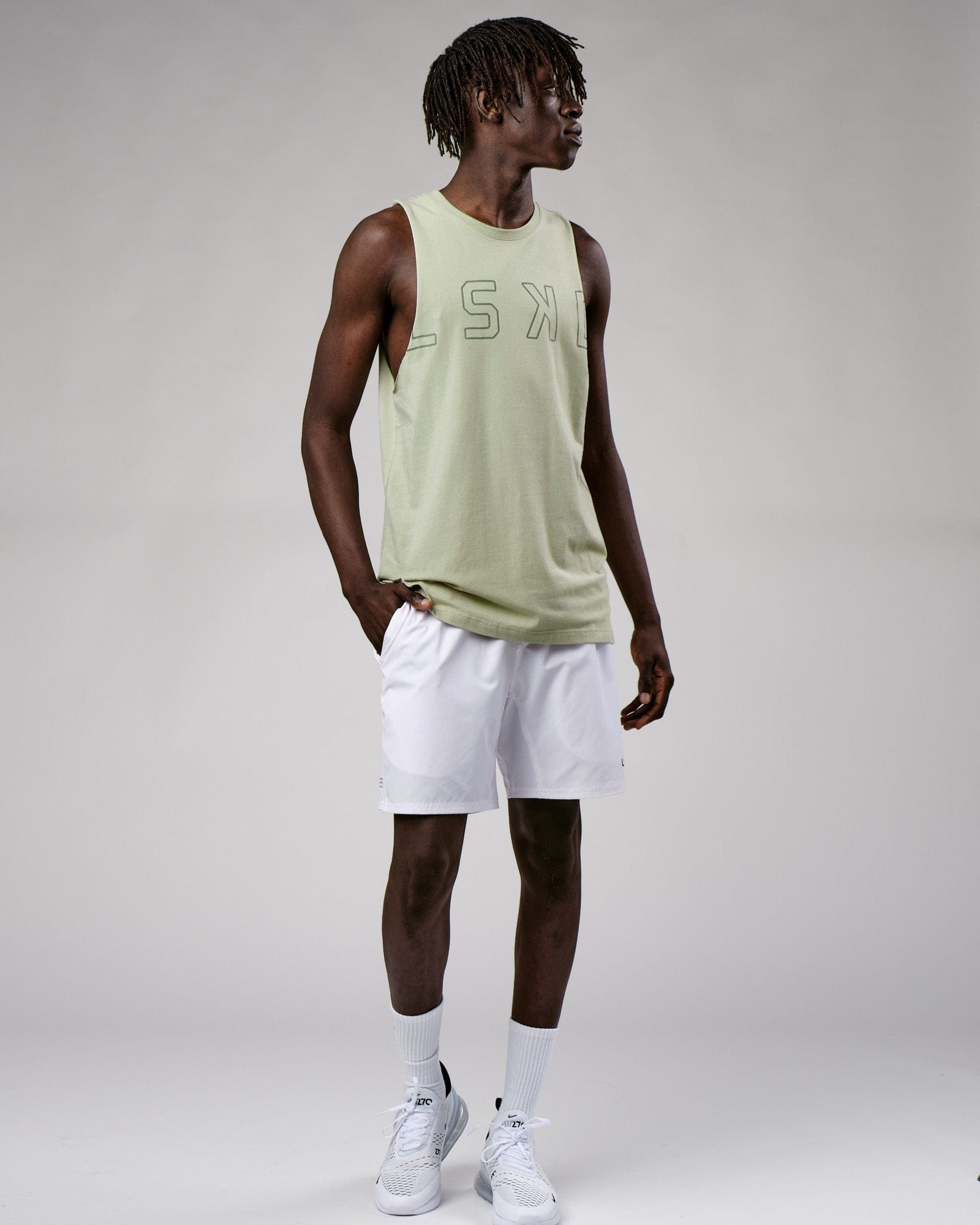 Model wearing Expand FLXCotton Training Fit Tank - Desert Sage