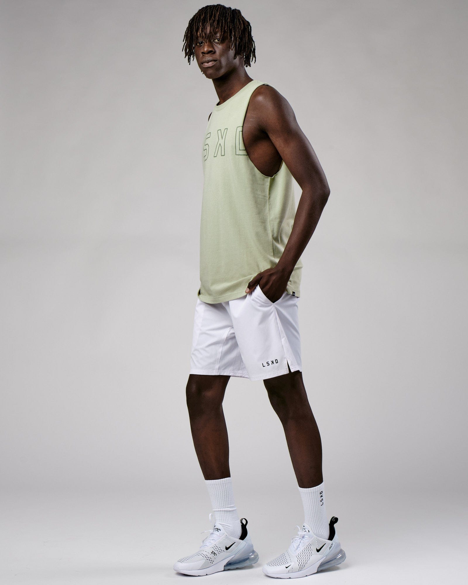 Model wearing Expand FLXCotton Training Fit Tank - Desert Sage