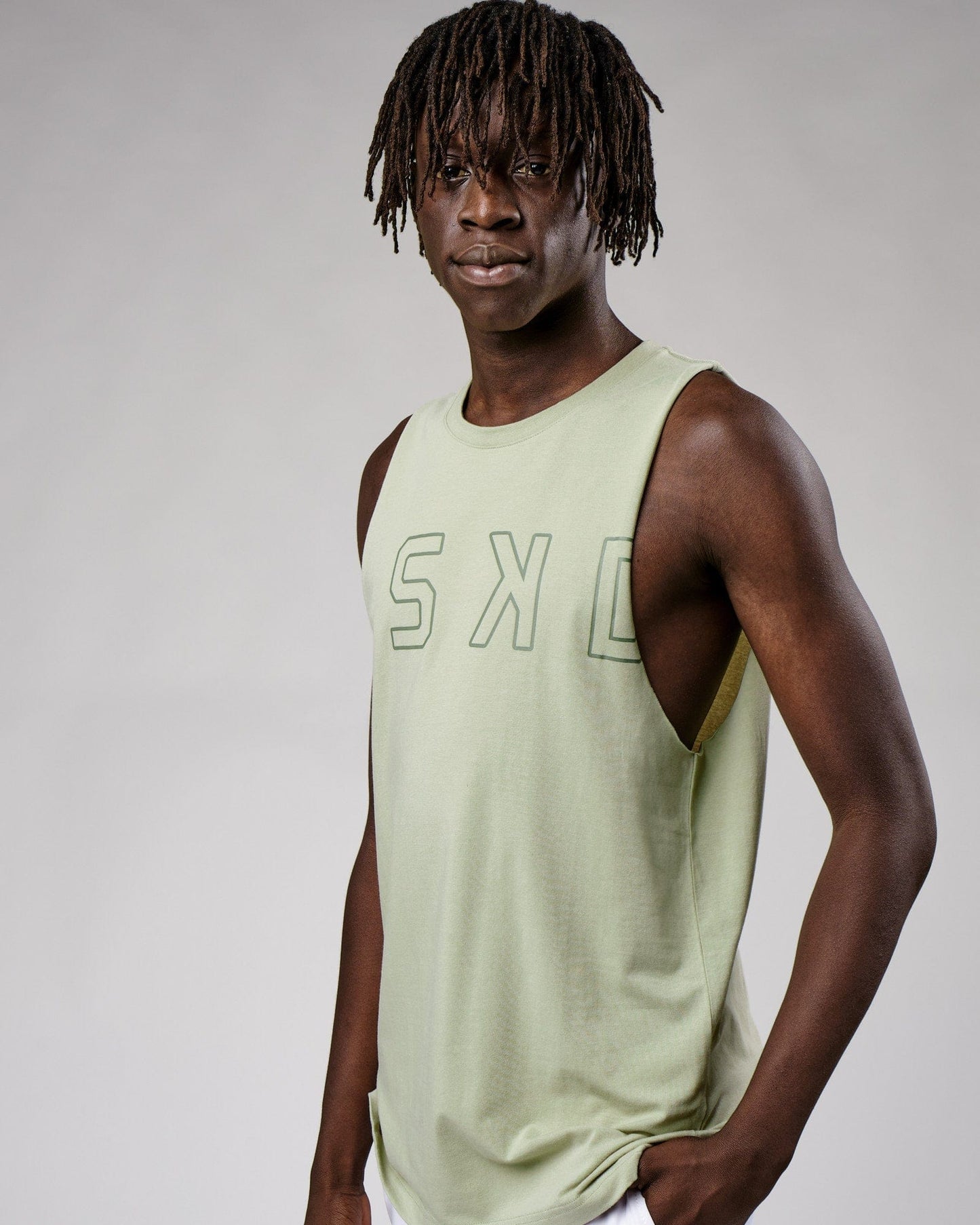 Model wearing Expand FLXCotton Training Fit Tank - Desert Sage