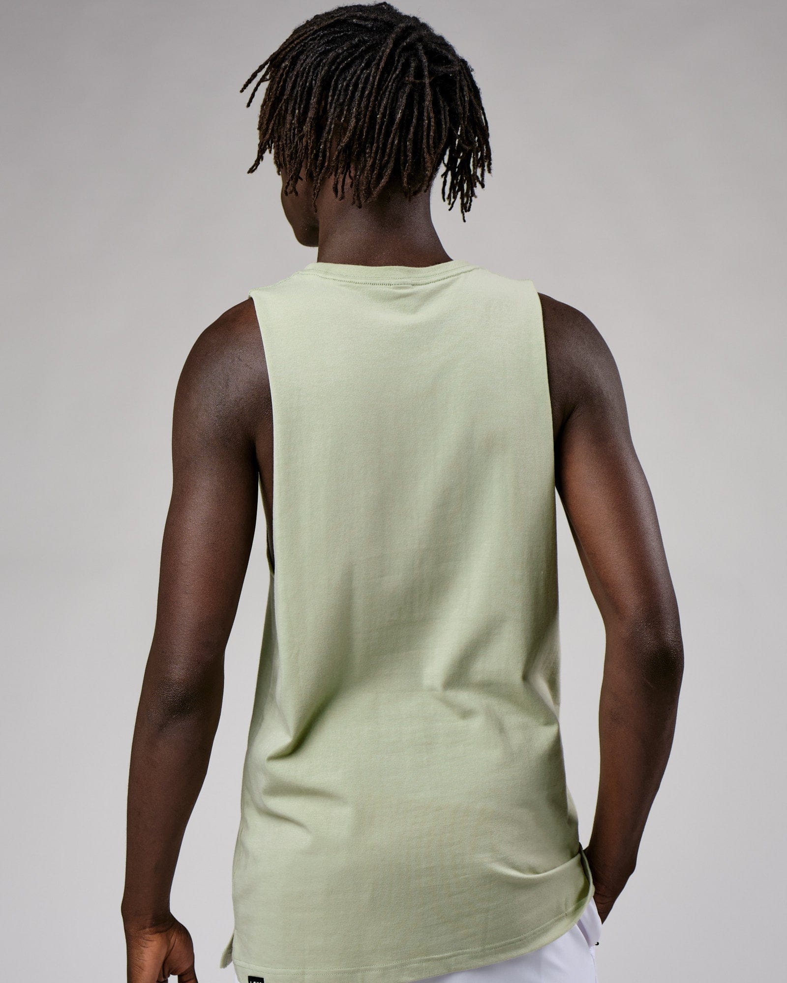 Model wearing Expand FLXCotton Training Fit Tank - Desert Sage