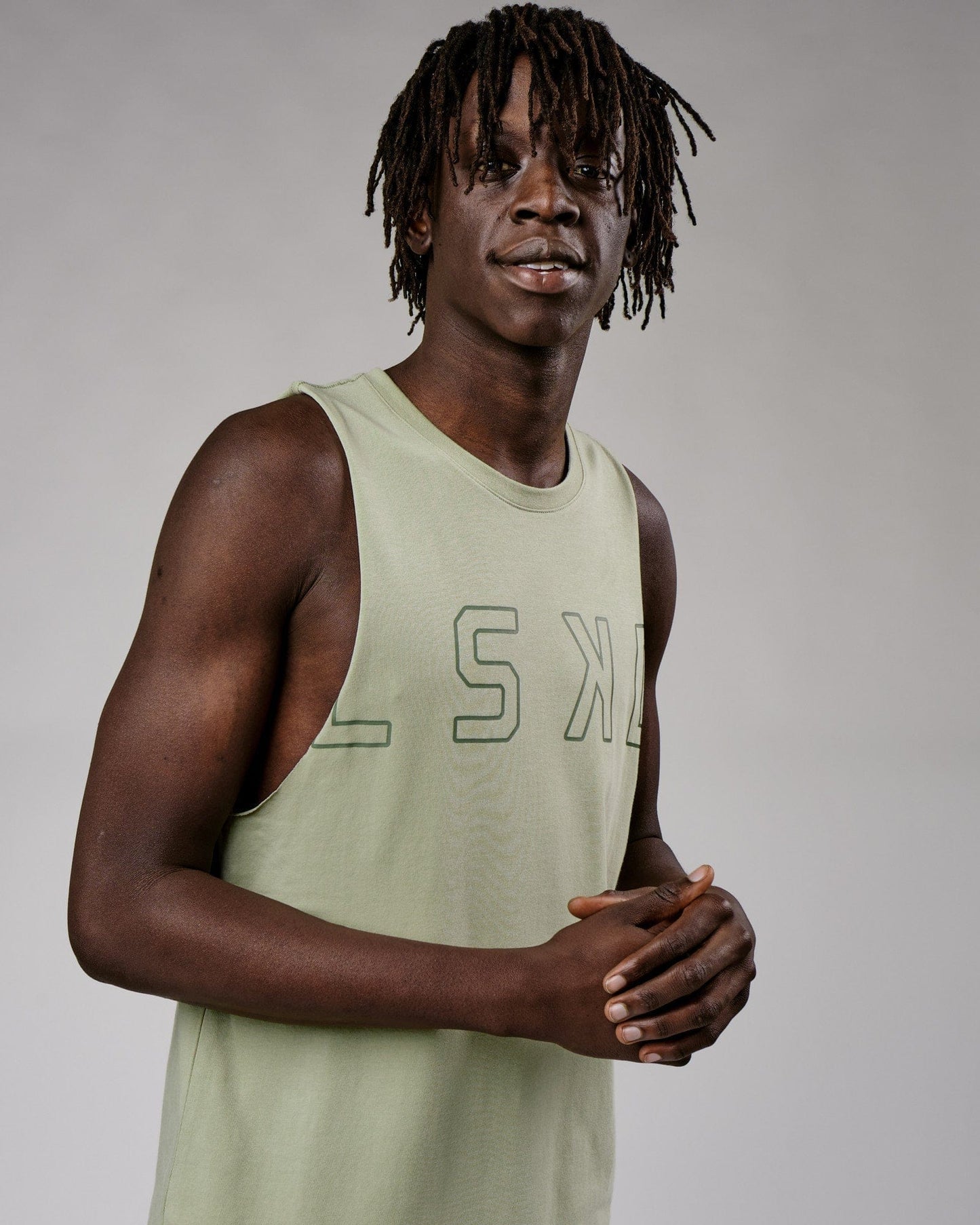 Model wearing Expand FLXCotton Training Fit Tank - Desert Sage