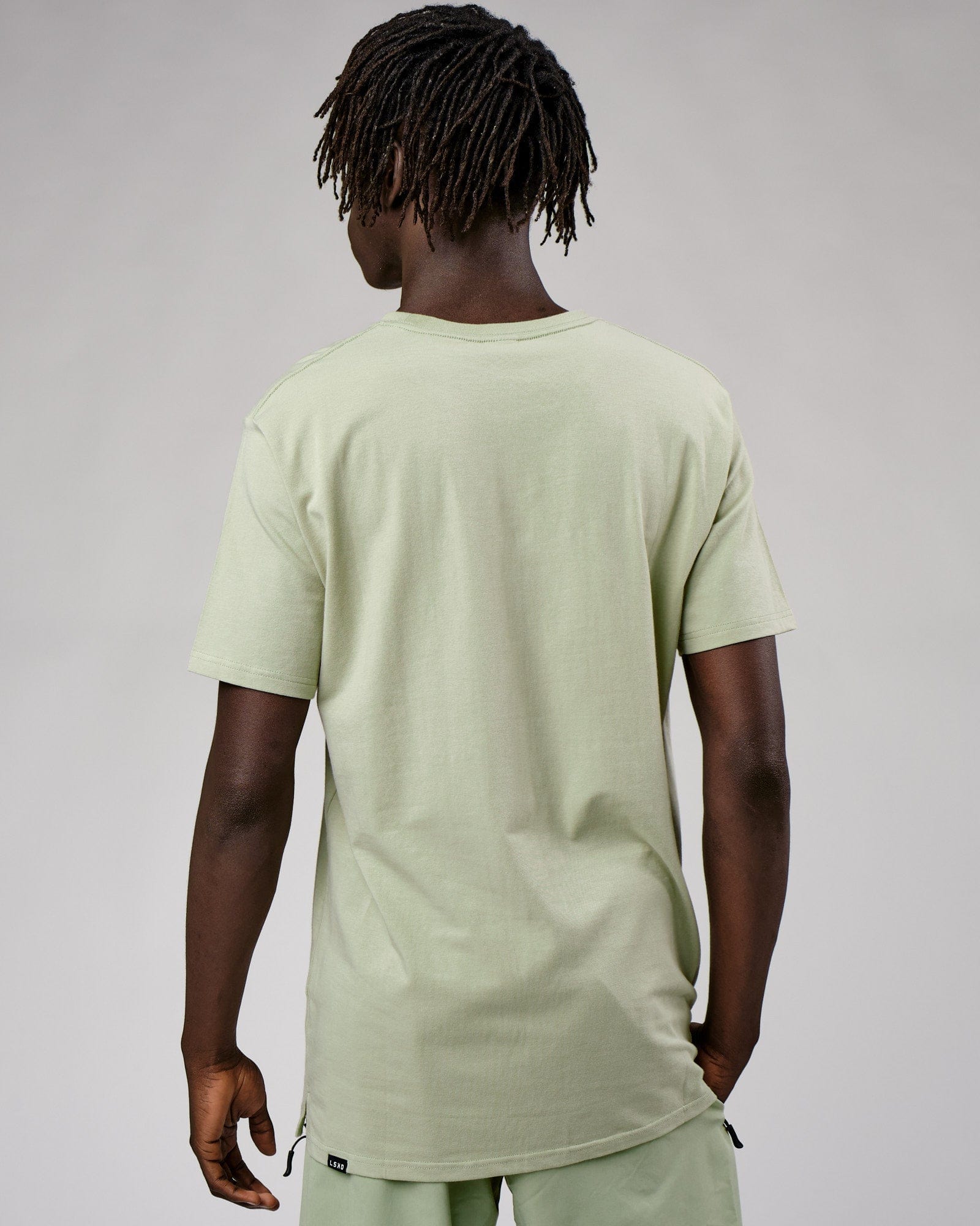 Model wearing Expand FLXCotton Tee - Desert Sage