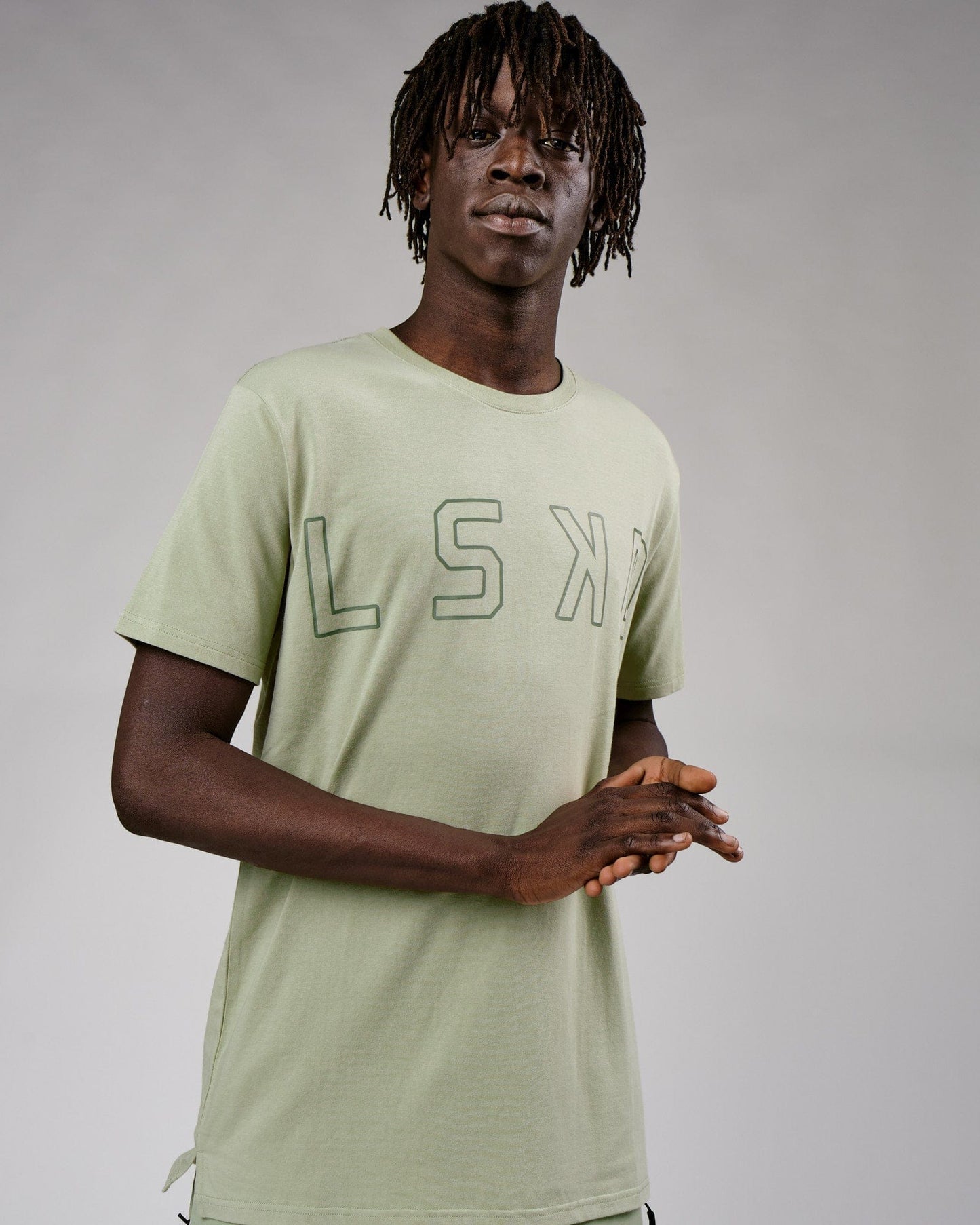 Model wearing Expand FLXCotton Tee - Desert Sage