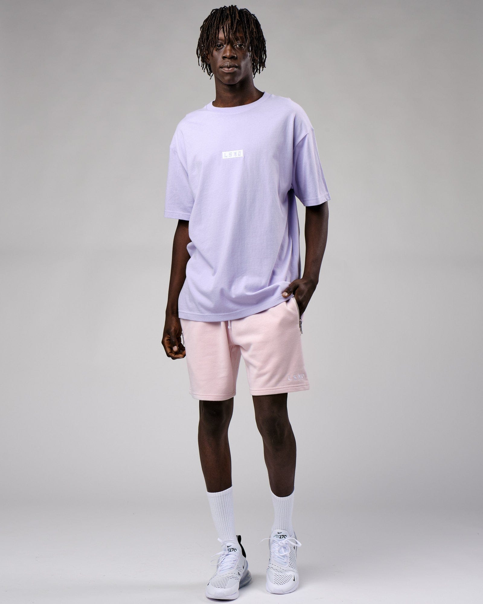 Model wearing Cornerstone Tee Oversize - Cosmic Sky