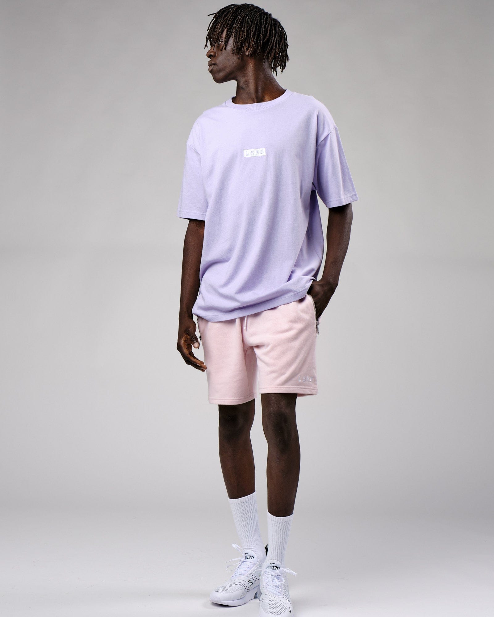 Model wearing Cornerstone Tee Oversize - Cosmic Sky