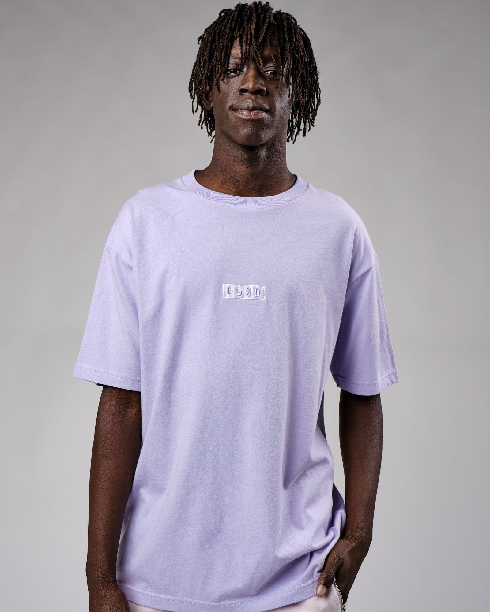 Model wearing Cornerstone Tee Oversize - Cosmic Sky