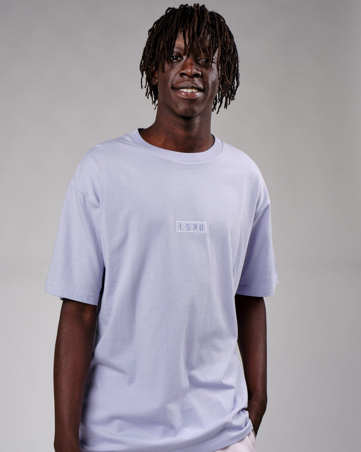 Model wearing Cornerstone Tee Oversize - Cosmic Sky