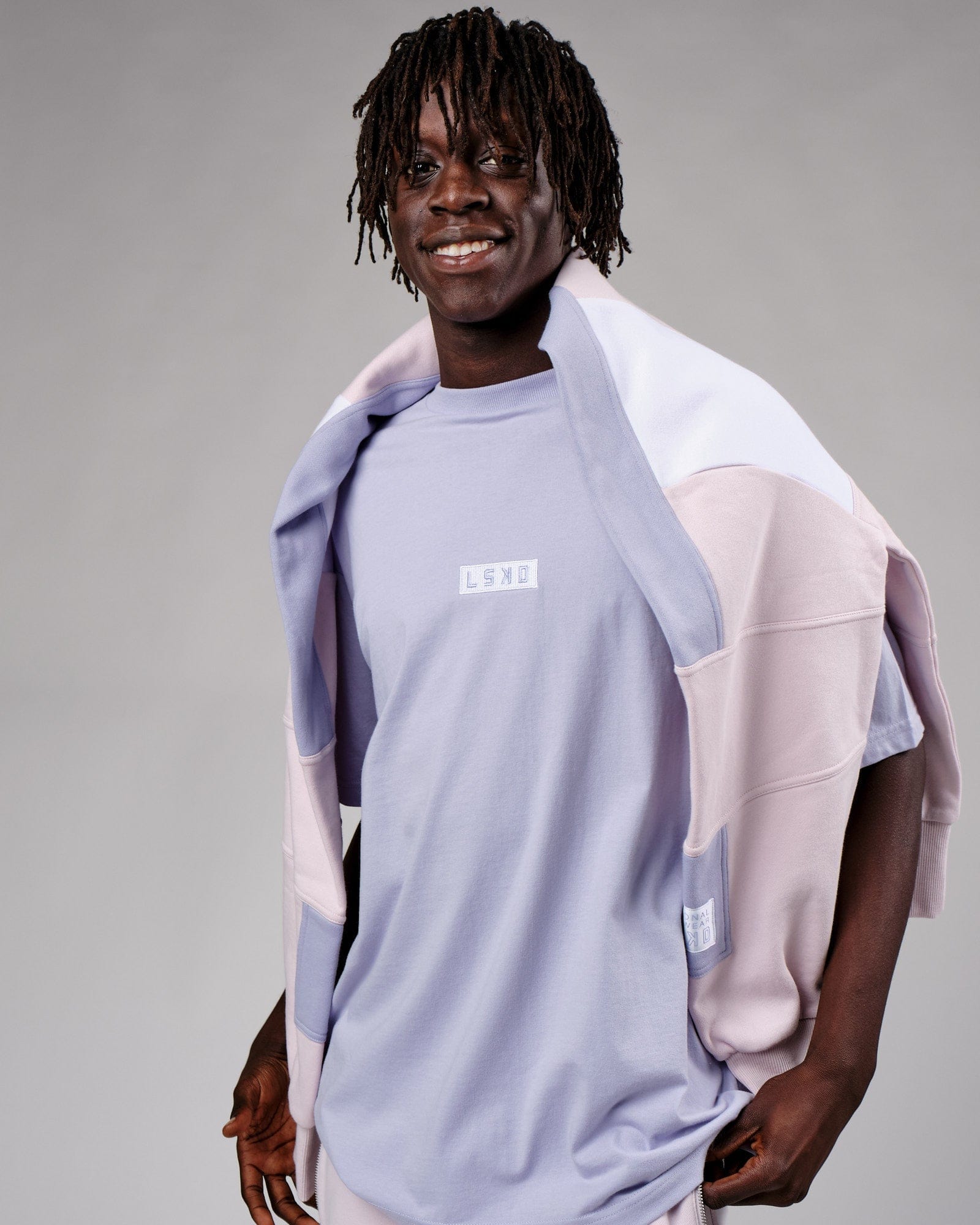 Model wearing Cornerstone Tee Oversize - Cosmic Sky