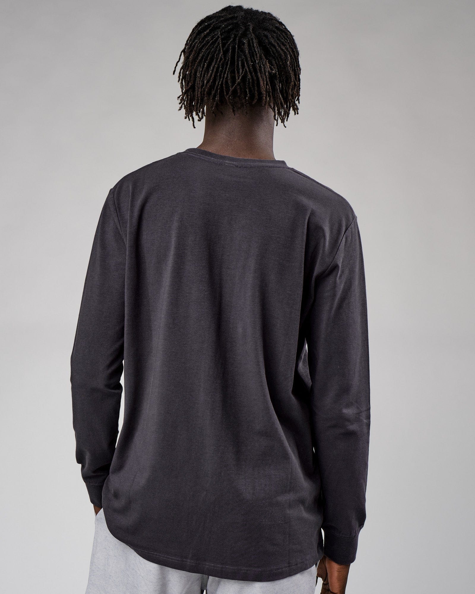 Model wearing Base LS Tee - Phantom