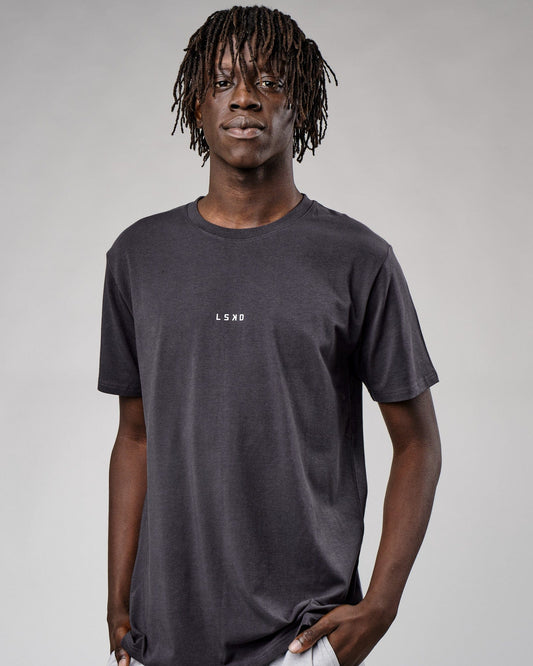 Model wearing Base Tee - Phantom