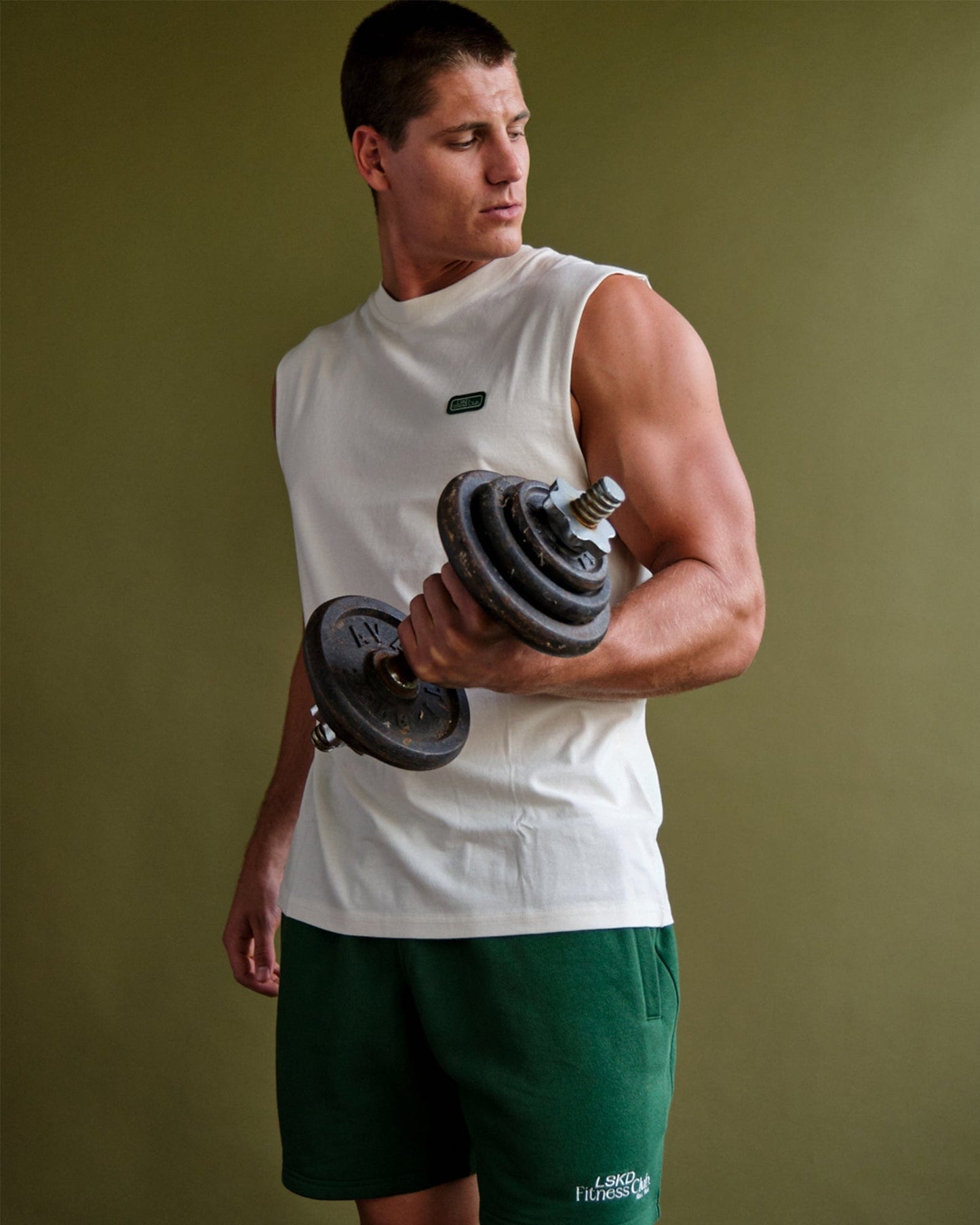 Model wearing Badge Tank Oversize - Cream