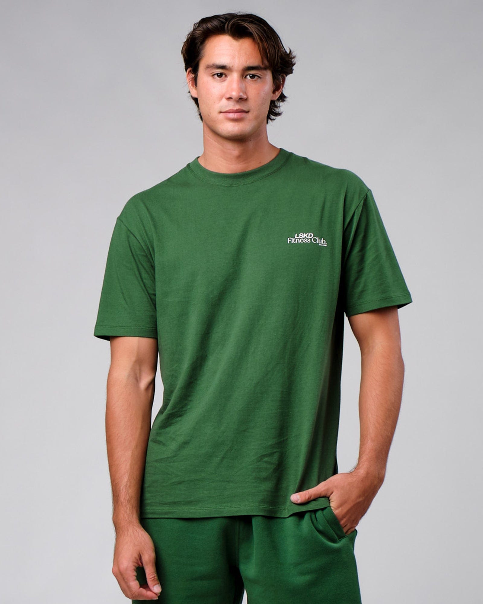 Model wearing Uplift Tee Oversize - Eden Green