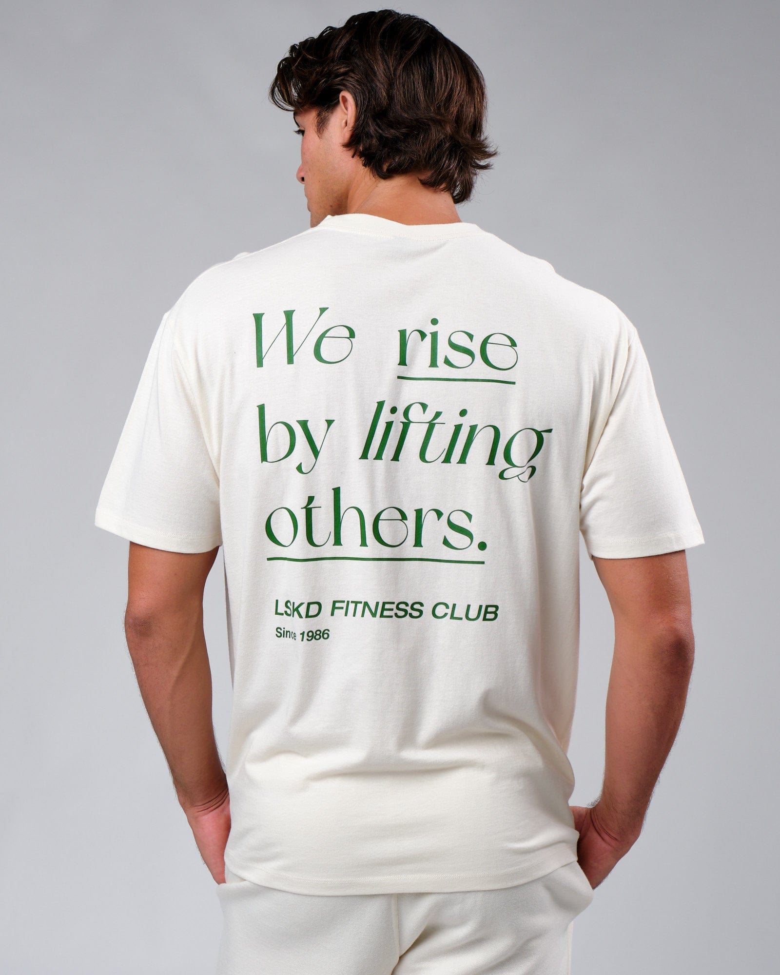 Model wearing Uplift Tee Oversize - Cream