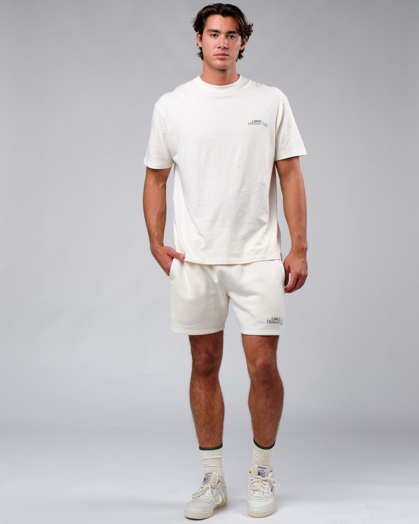 Model wearing Uplift Tee Oversize - Cream