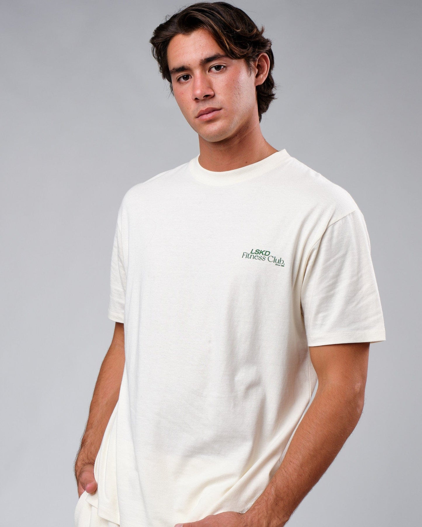 Model wearing Uplift Tee Oversize - Cream