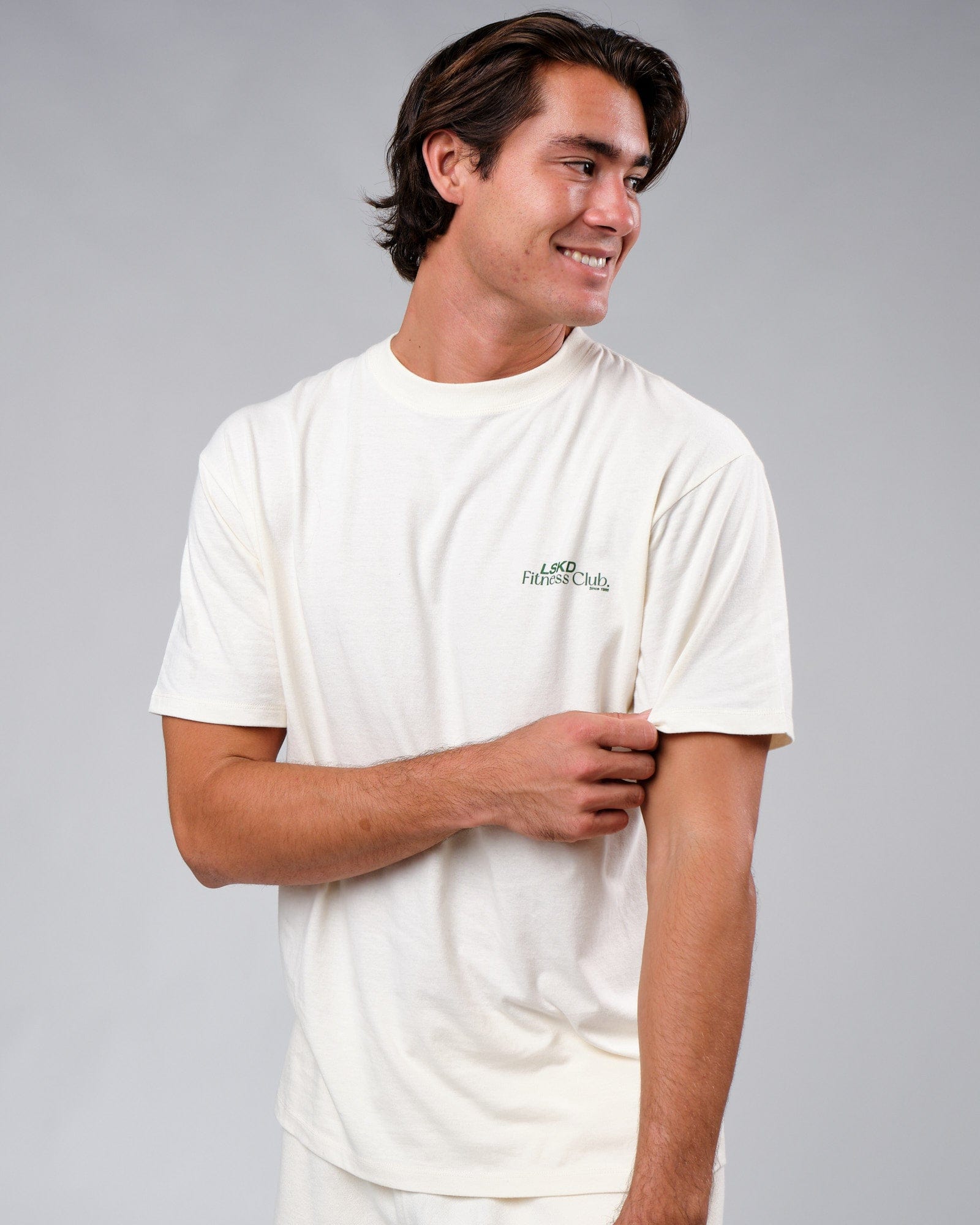 Model wearing Uplift Tee Oversize - Cream