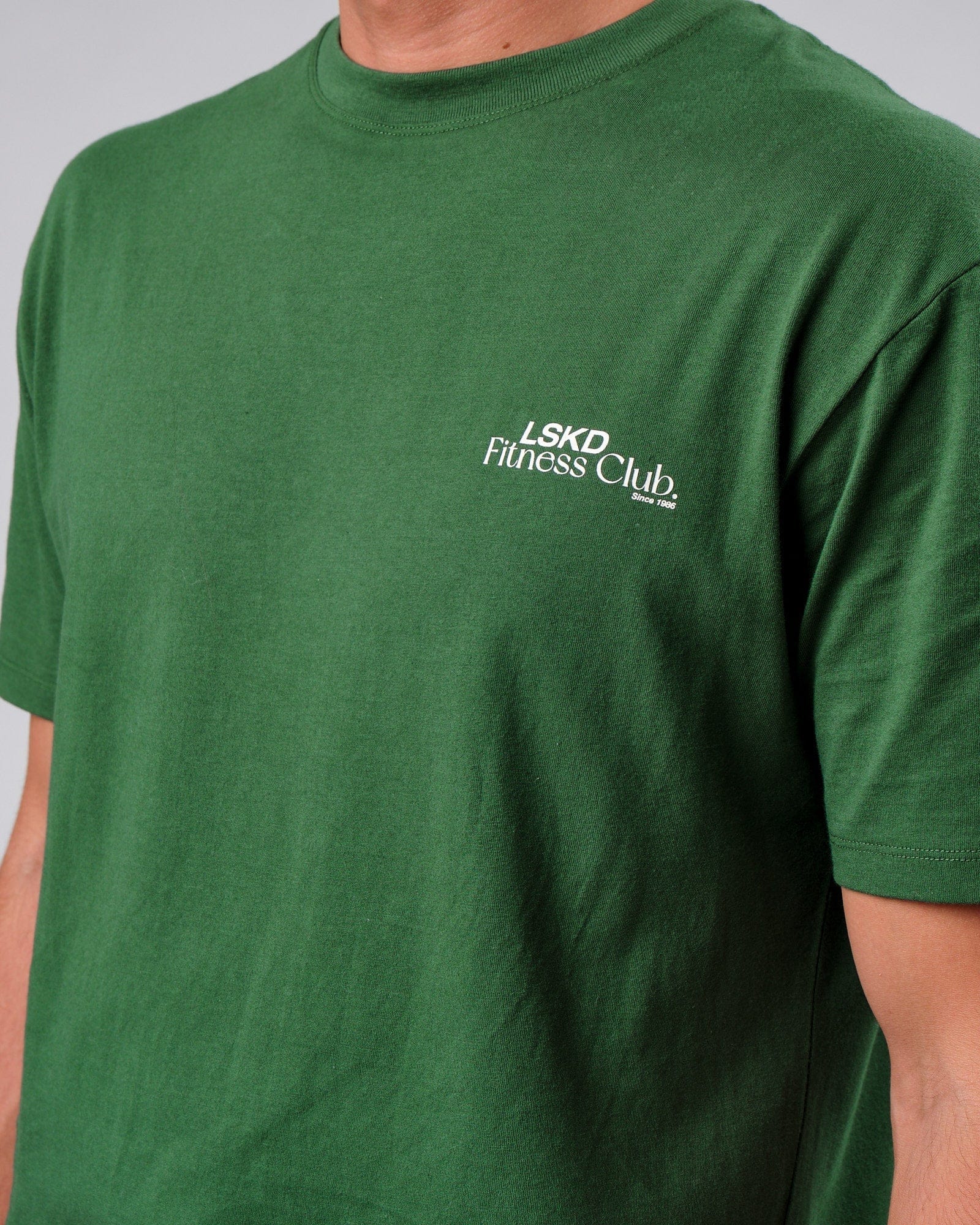 Model wearing Uplift Tee Oversize - Eden Green